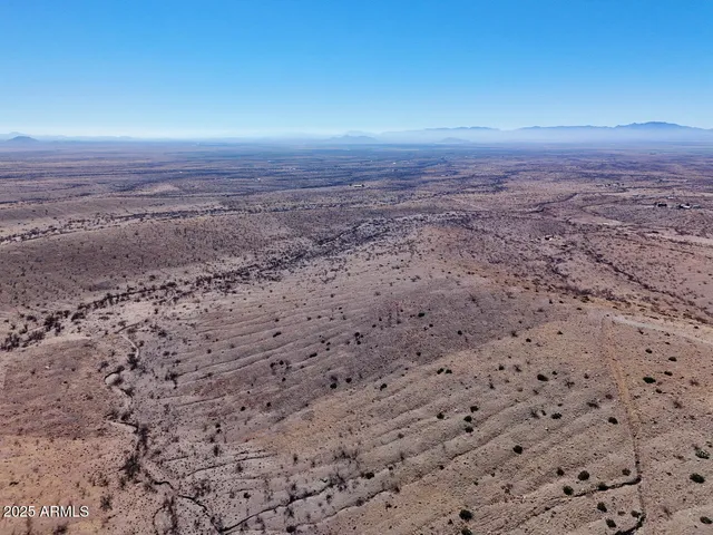 a view of a open area with a yard