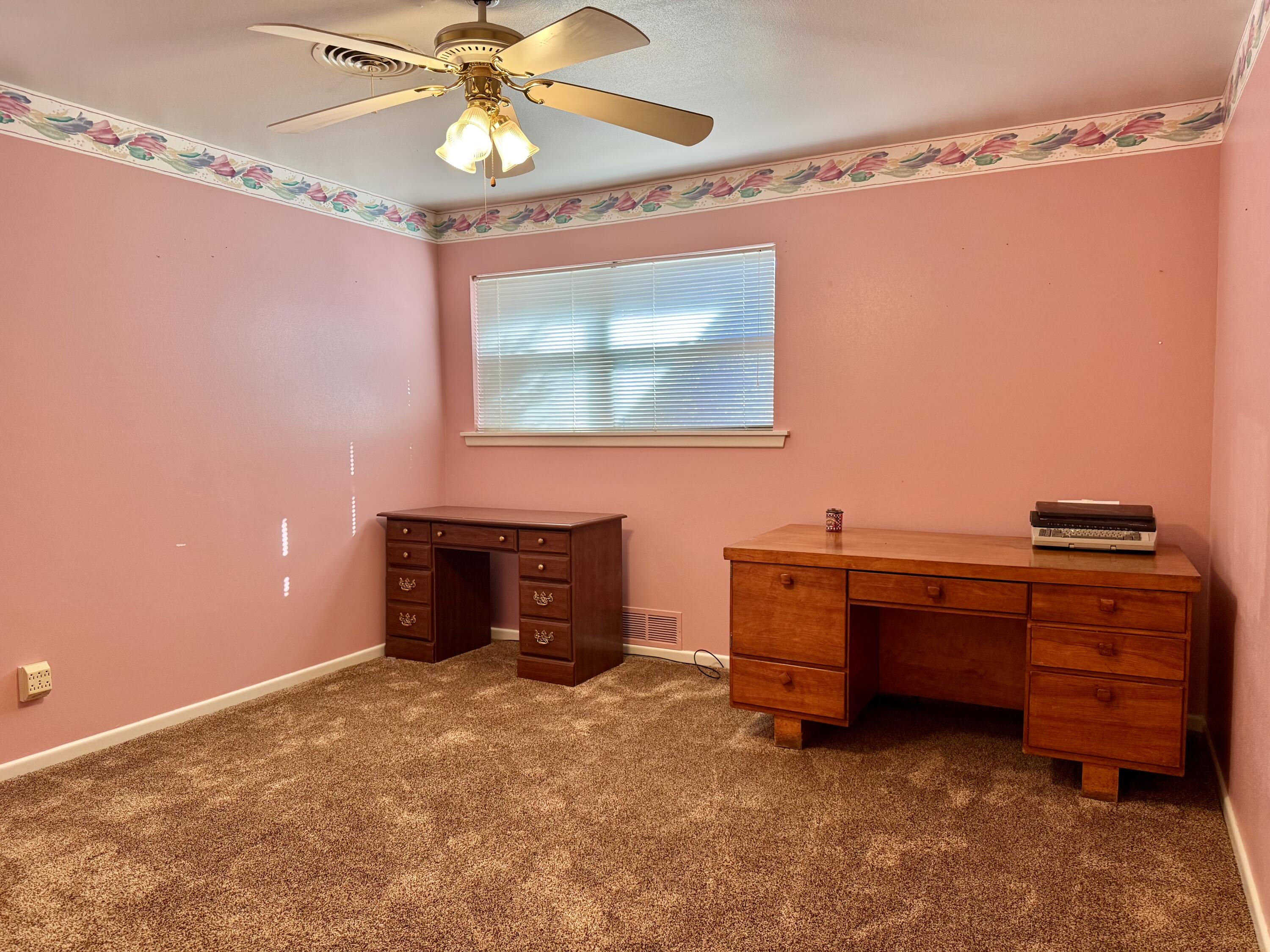 2208 South 4th Street Lamesa, TX 79331 - Photo 21 of 36 a view of a workspace with furniture