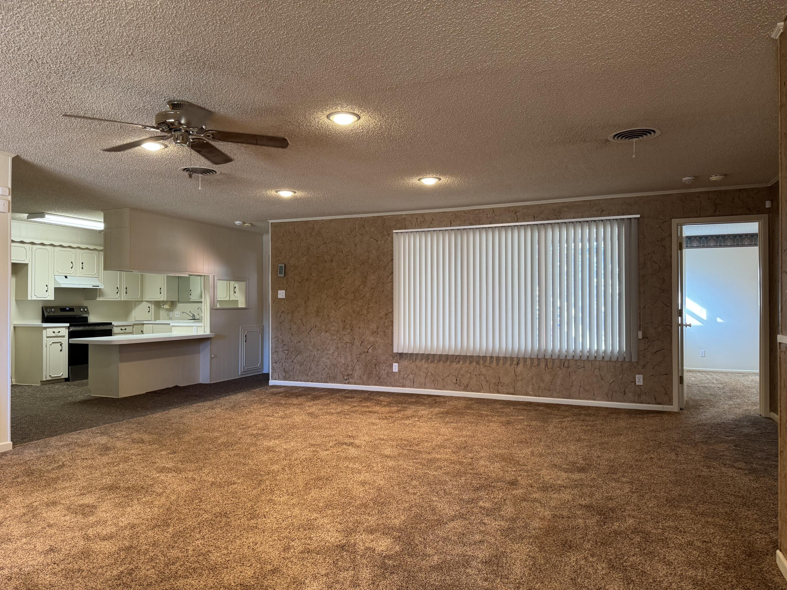 2208 South 4th Street Lamesa, TX 79331 - Photo 3 of 36 a view of kitchen and window