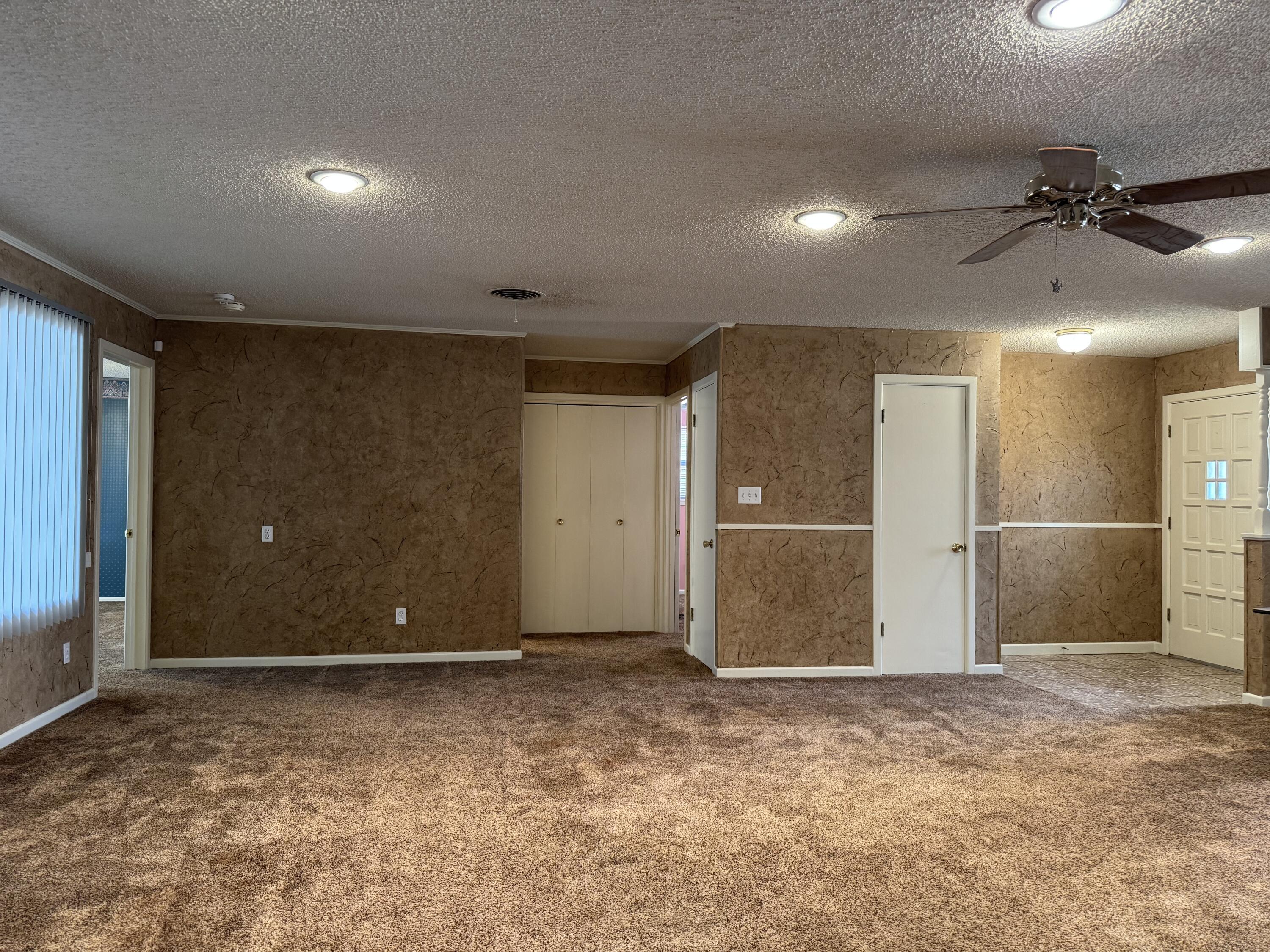 2208 South 4th Street Lamesa, TX 79331 - Photo 5 of 36 a view of an empty room