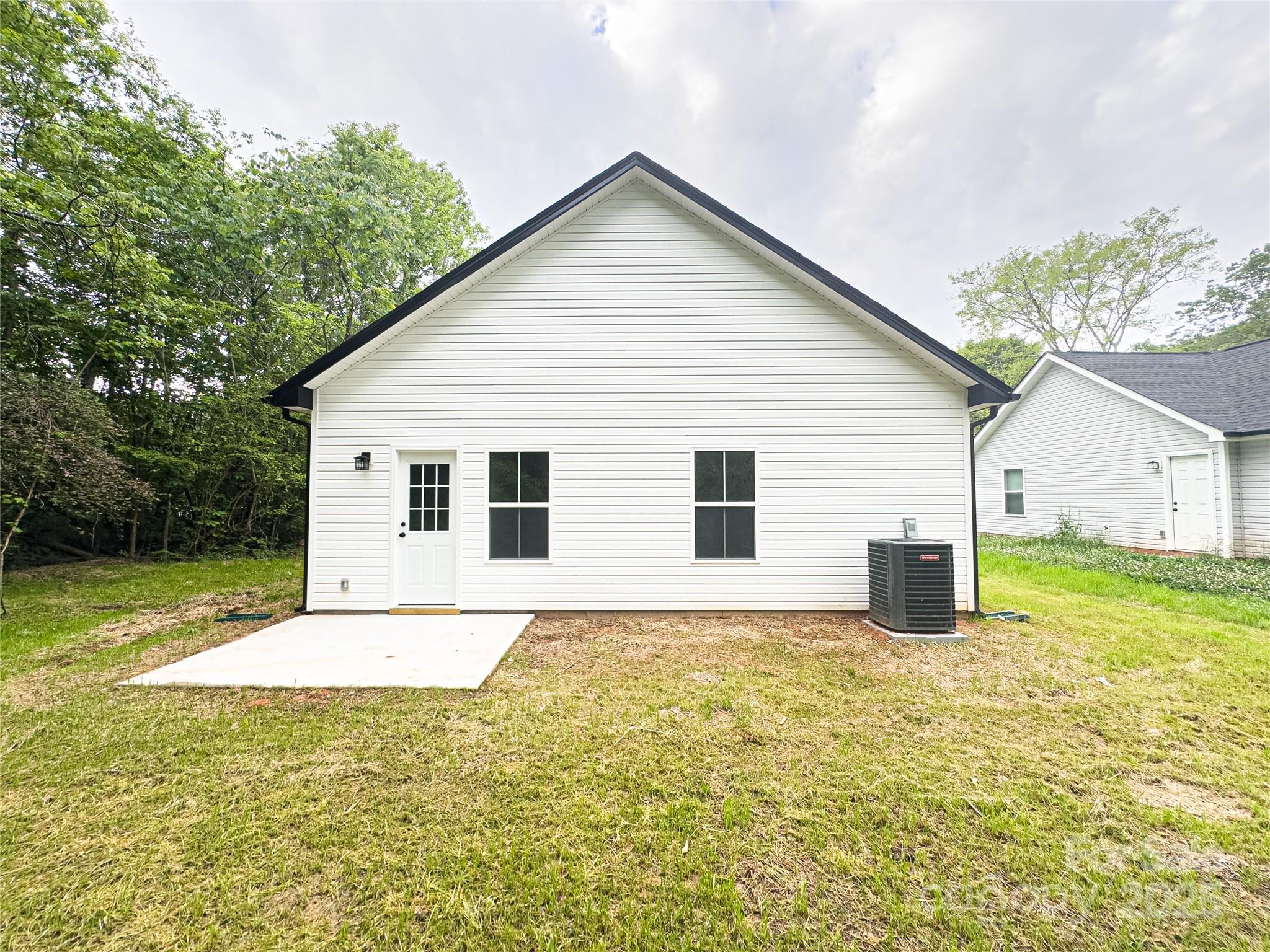 1 Lincoln Street Southwest Concord, NC 28025 - Photo 16 of 16 a view of a house with a yard