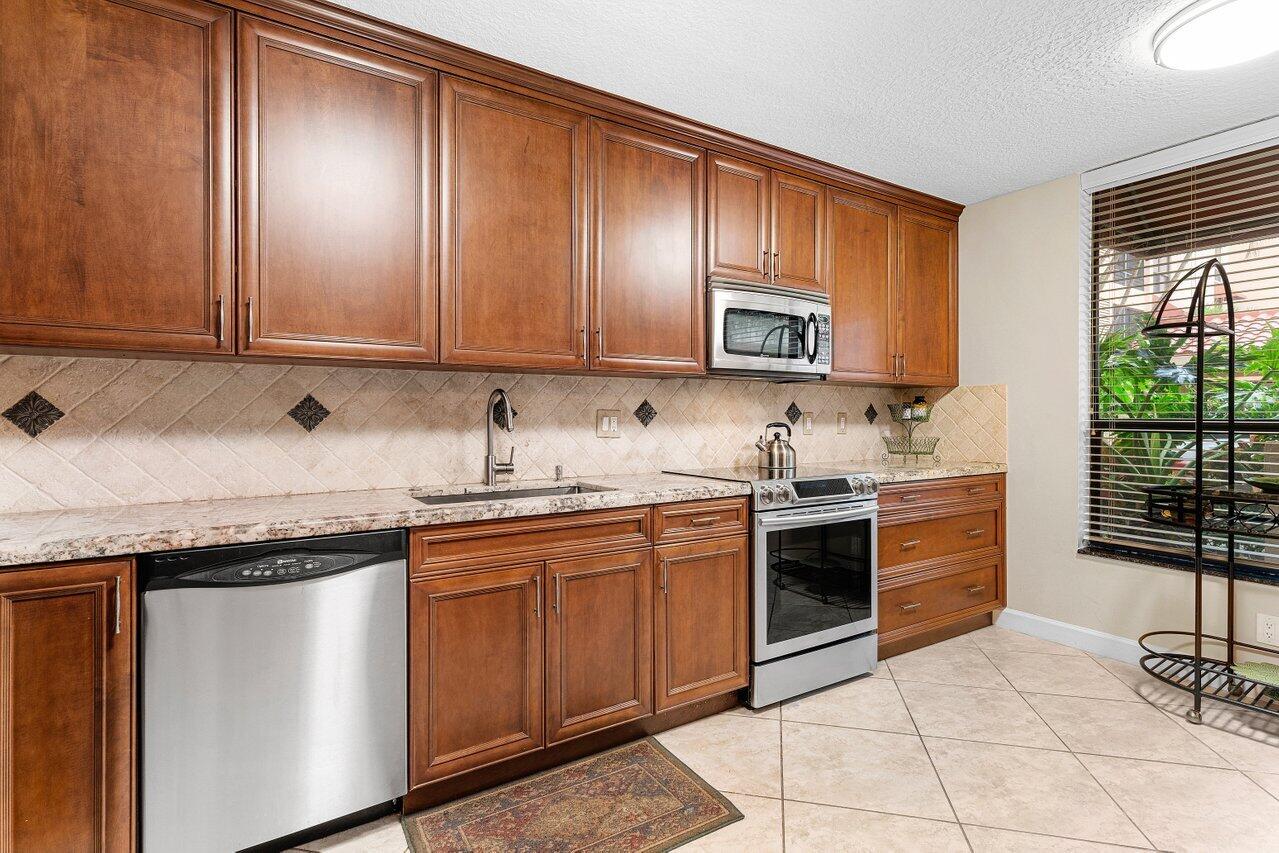 7129 Promenade Drive, Unit 102 Boca Raton, FL 33433 - Photo 9 of 38 003-7129PromenadeDrive-102-BocaRaton-FL-