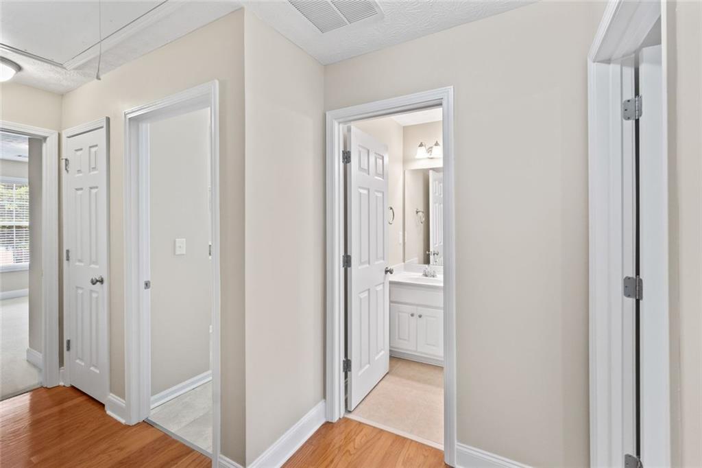 241 Red Bud Road Jefferson, GA 30549 - Photo 6 of 43 a view of a hallway with wooden floor