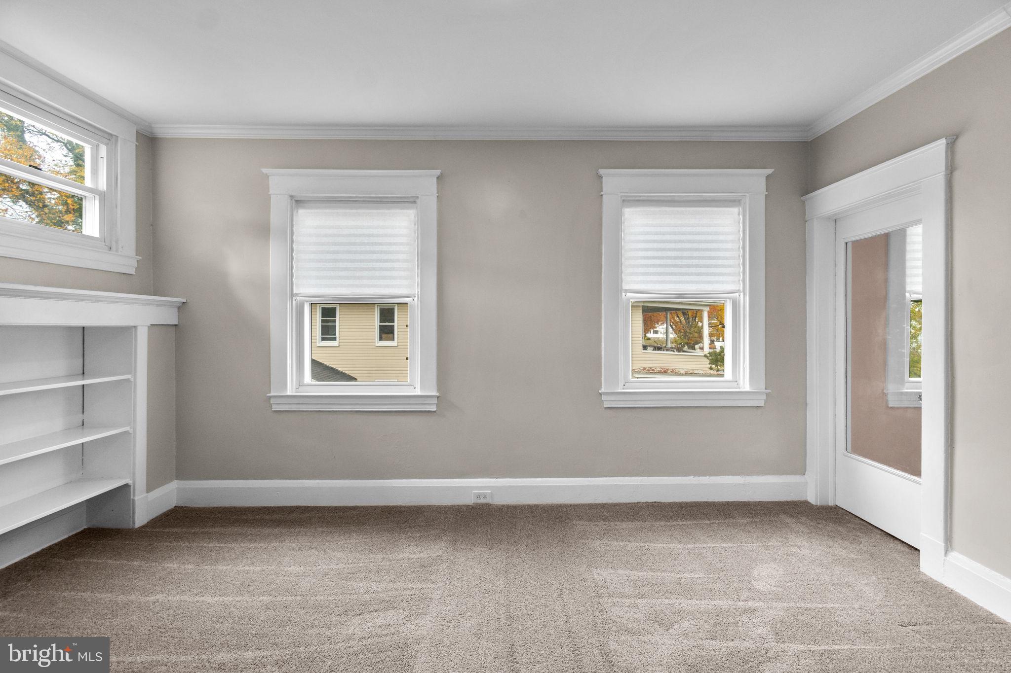 4213 Springdale Avenue Baltimore, MD 21207 - Photo 25 of 41 a view of an empty room with a window