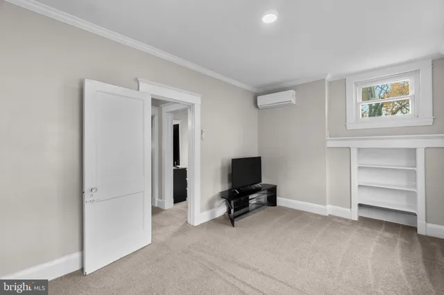 a view of workspace with cabinet cabinet and window
