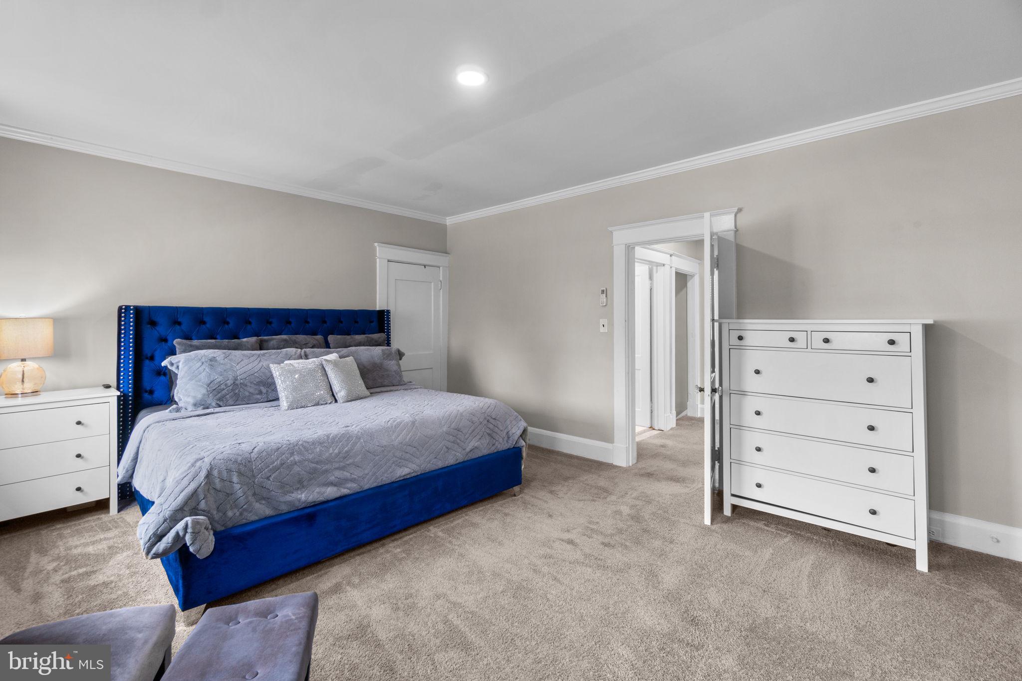 4213 Springdale Avenue Baltimore, MD 21207 - Photo 31 of 41 a bedroom with a bed and closet