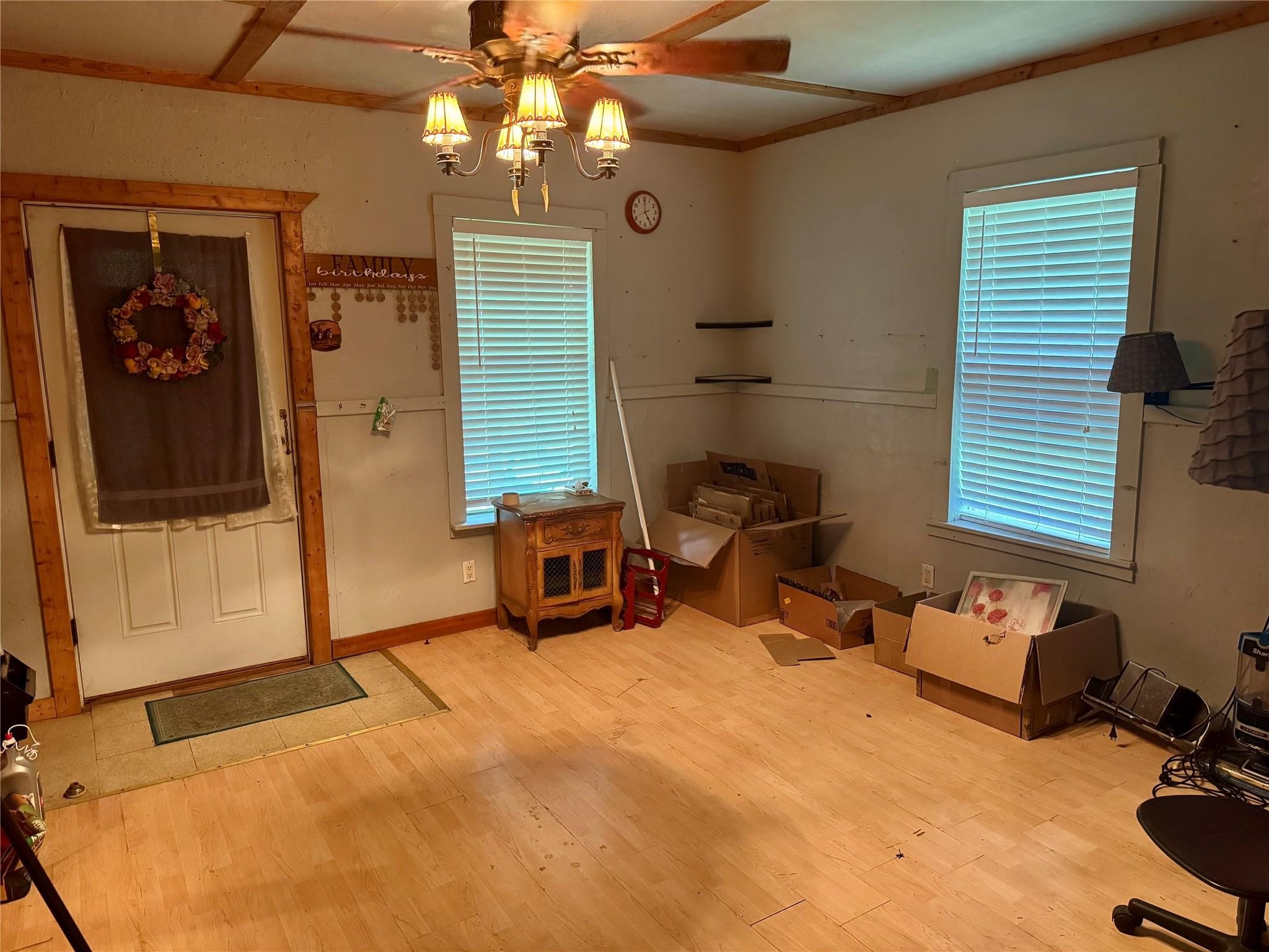 385 Ole Long Pull Road Livingston, TX 77351 - Photo 3 of 12 a bedroom with furniture and a window