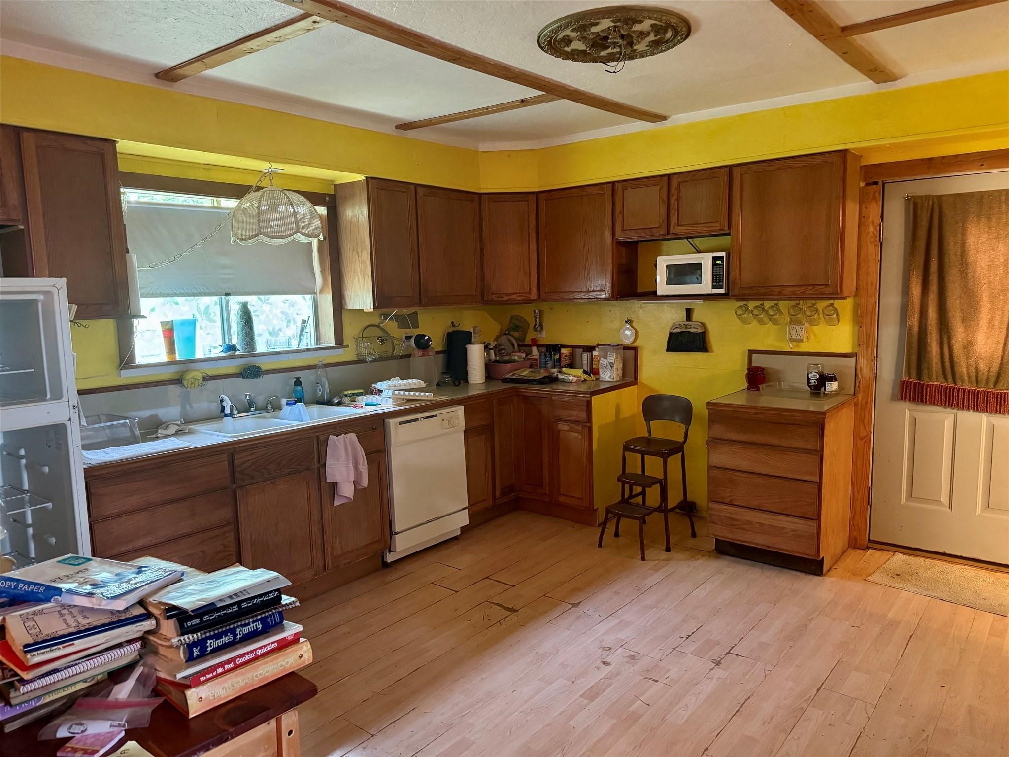 385 Ole Long Pull Road Livingston, TX 77351 - Photo 4 of 12 a kitchen with stainless steel appliances granite countertop a refrigerator and stove