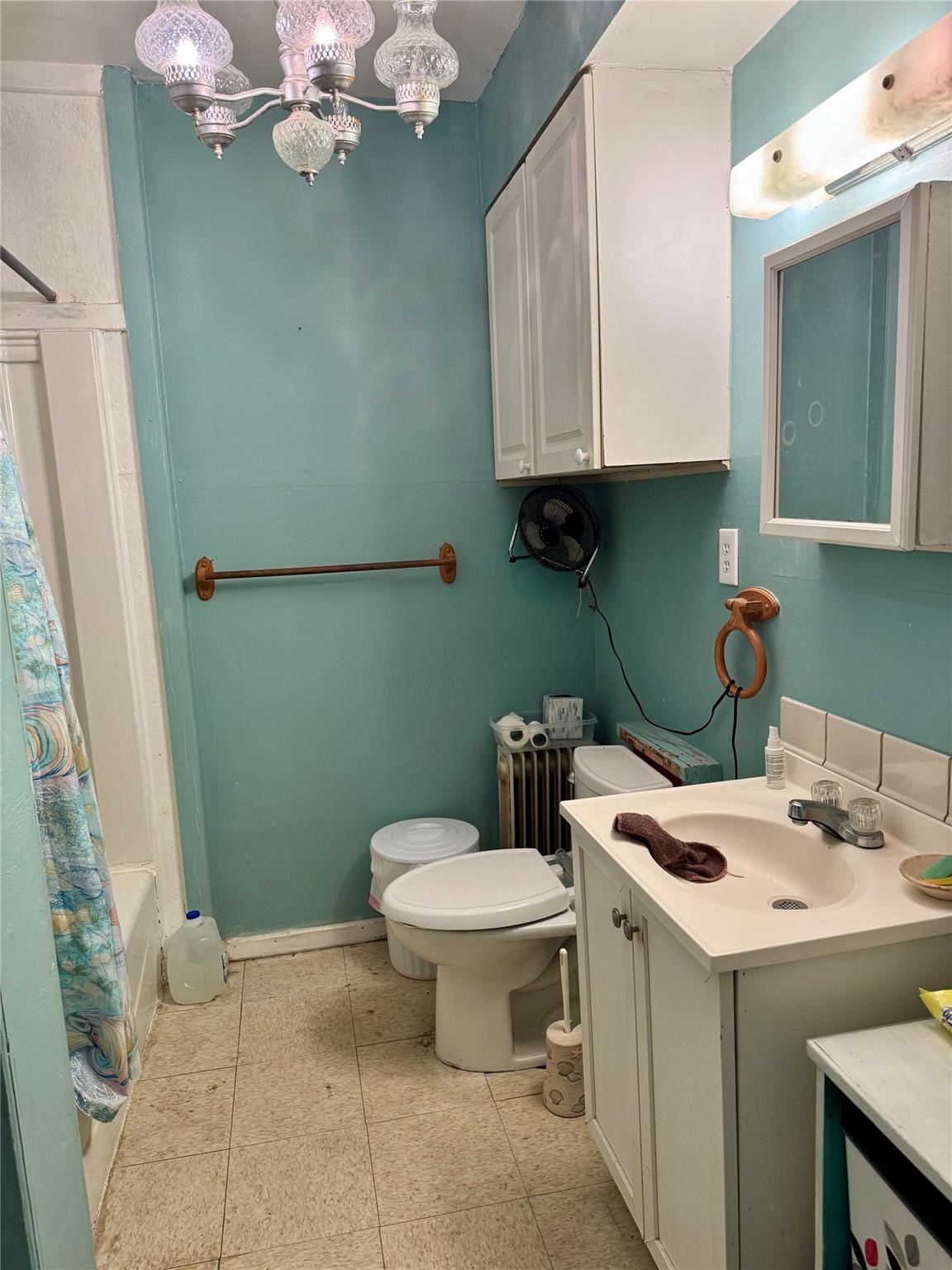 385 Ole Long Pull Road Livingston, TX 77351 - Photo 8 of 12 a bathroom with a sink a toilet and mirror