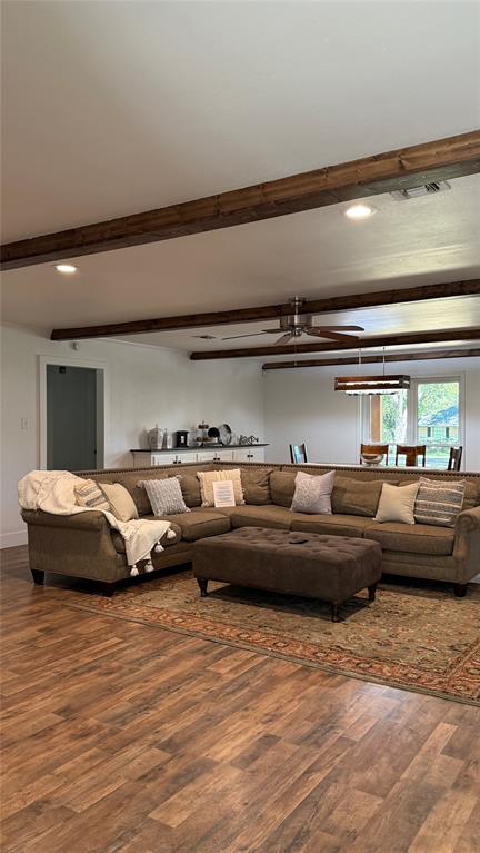 8513 Ravenswood Road Granbury, TX 76049 - Photo 7 of 21 Wood-finish flooring throughout, complemented by exposed ceiling beams