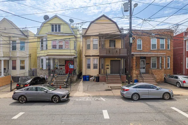 a car parked in front of a building