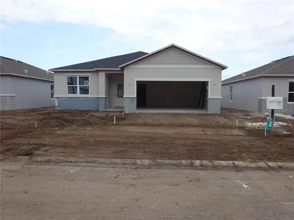 a front view of house with yard