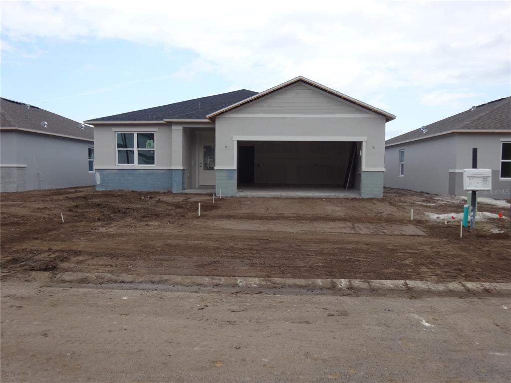 a front view of house with yard