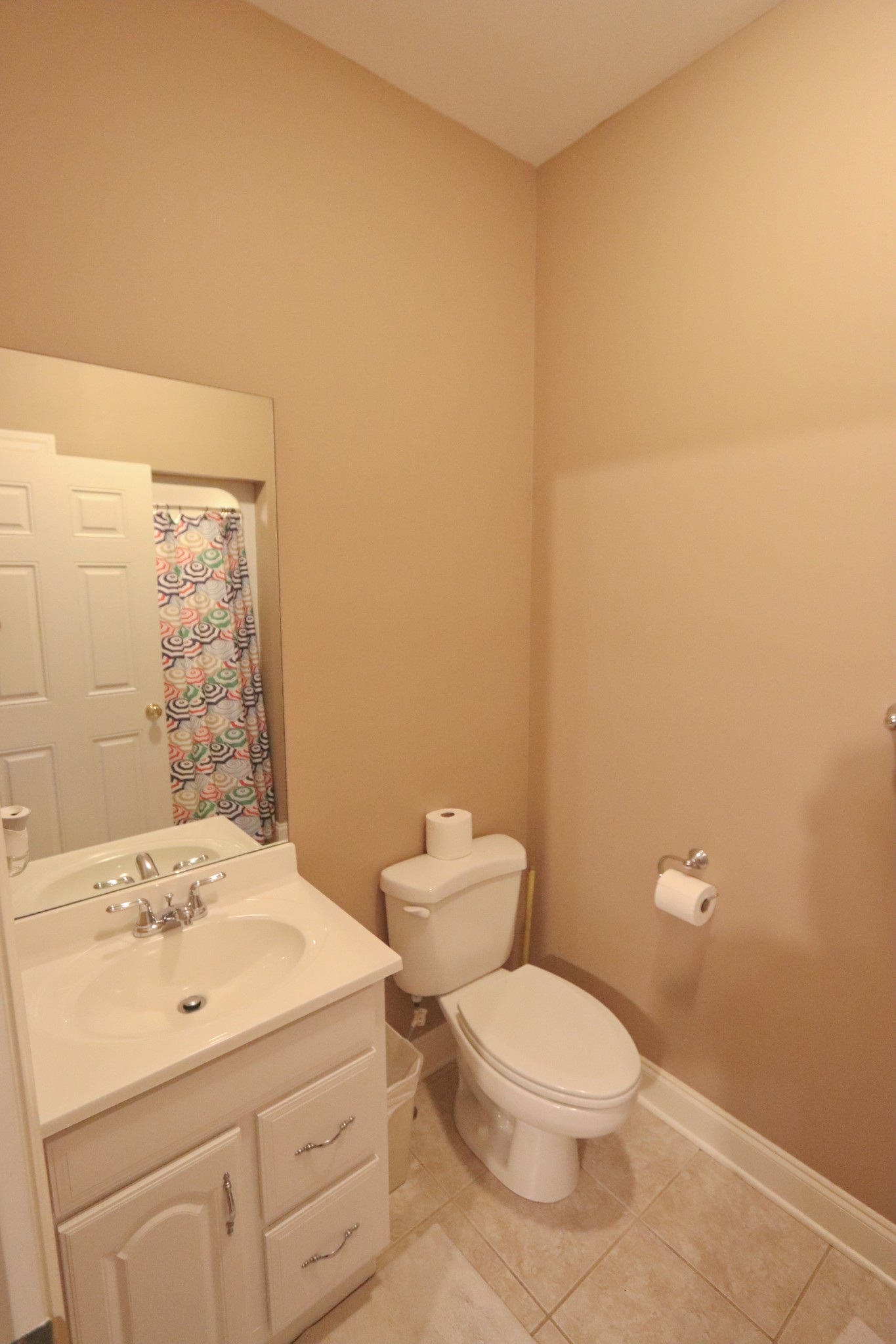 621 Hamilton Chambers Road Lebanon, TN 37087 - Photo 15 of 37 a white toilet sitting next to a bathroom sink