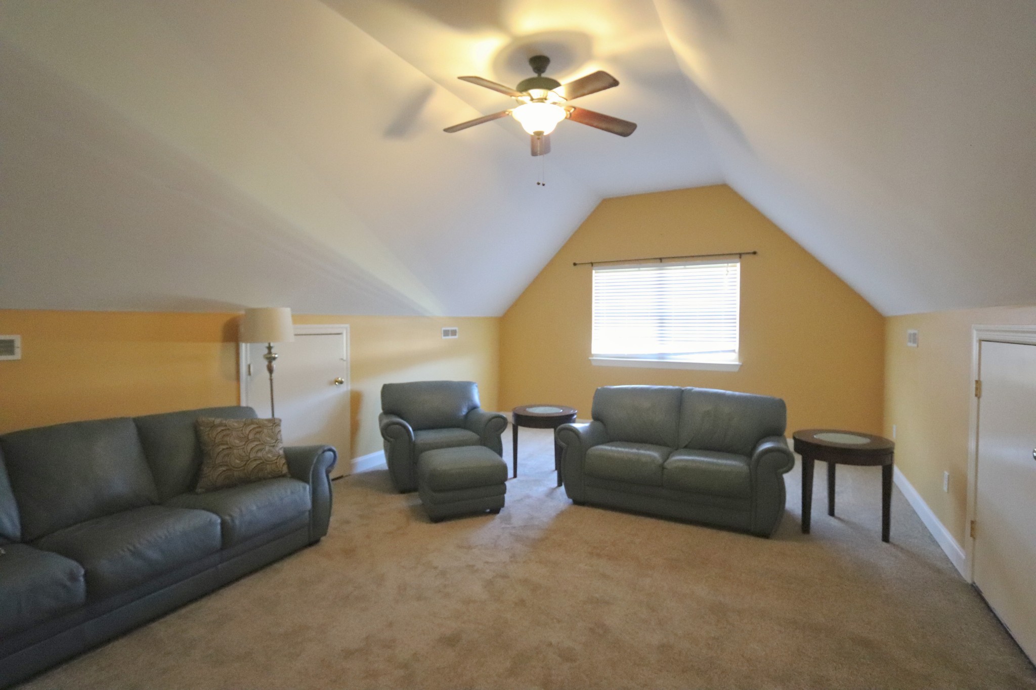 621 Hamilton Chambers Road Lebanon, TN 37087 - Photo 24 of 37 a living room with furniture a bed and a chandelier