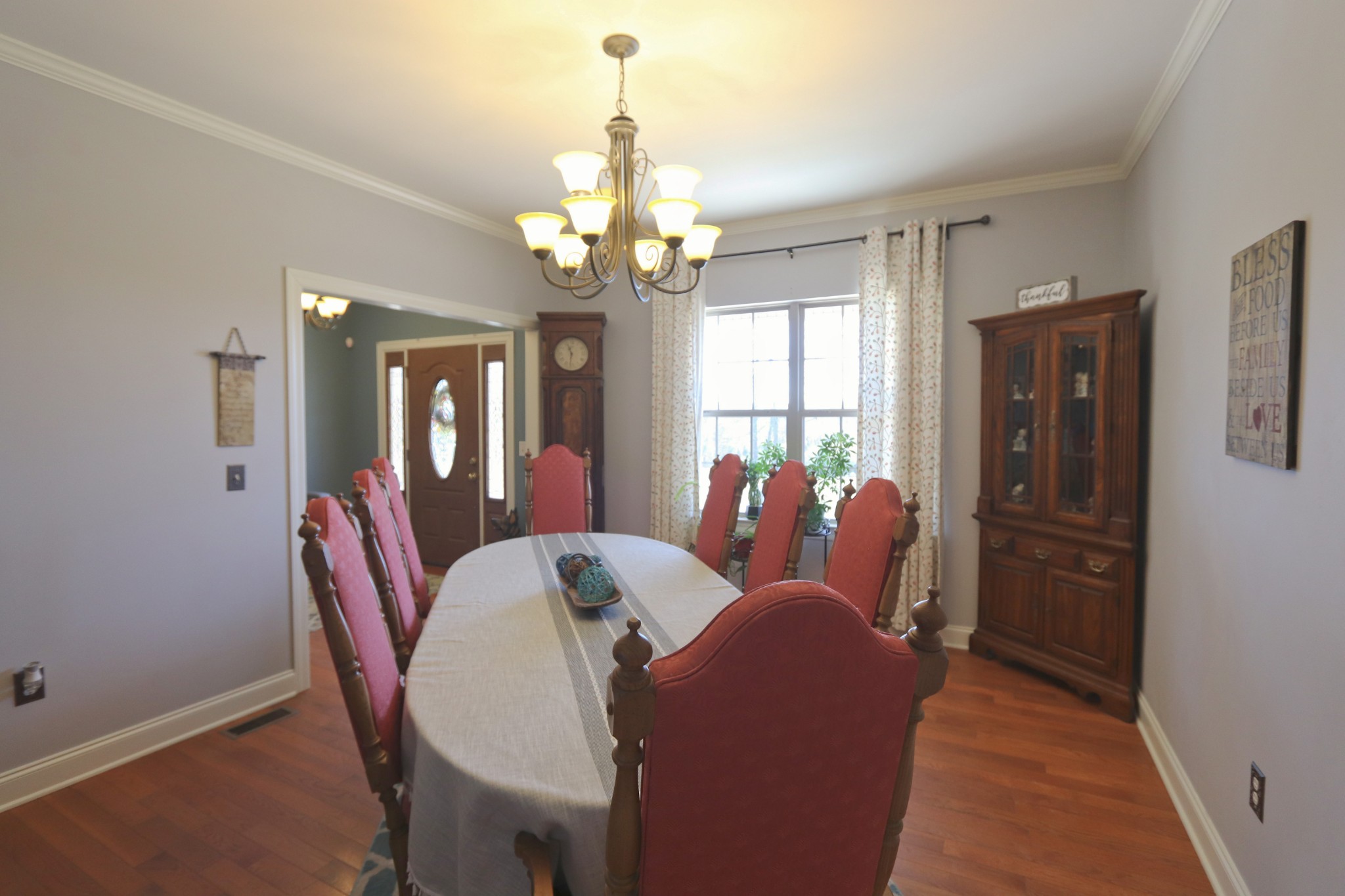 621 Hamilton Chambers Road Lebanon, TN 37087 - Photo 8 of 37 a view of a dining room with furniture and a chandelier