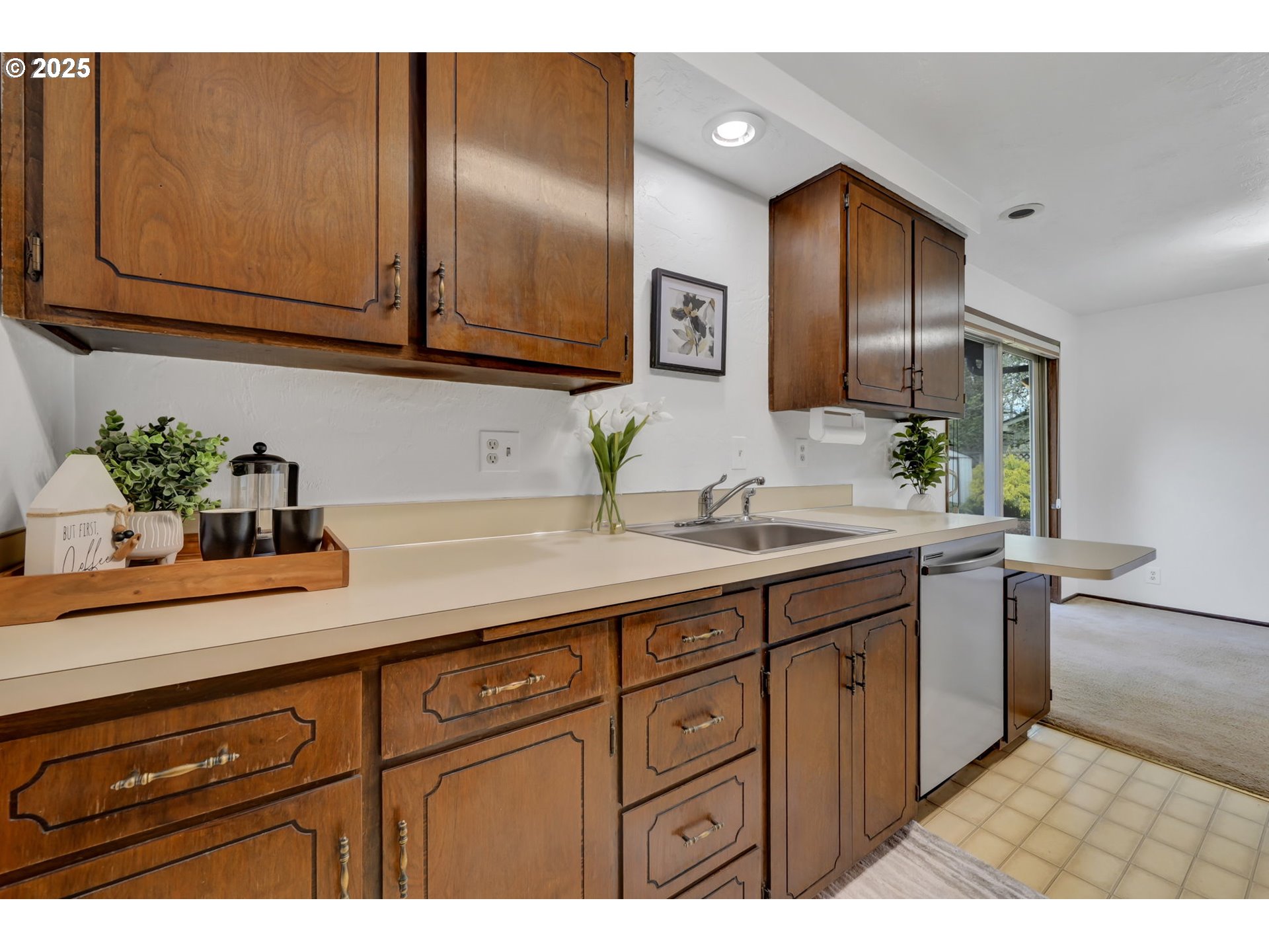 2480 Chuckanut Street Eugene, OR 97408 - Photo 15 of 44 a kitchen with sink and cabinets