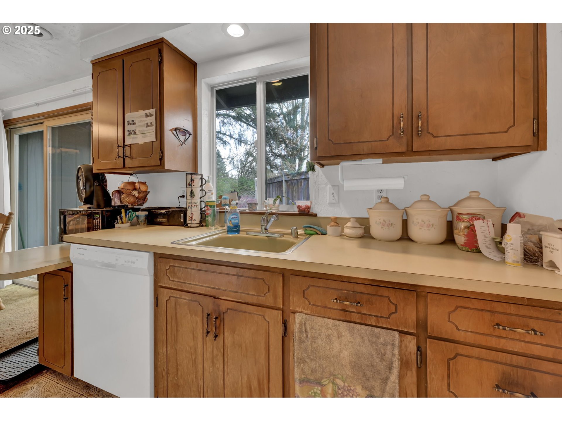 2480 Chuckanut Street Eugene, OR 97408 - Photo 32 of 44 a kitchen with sink and cabinets