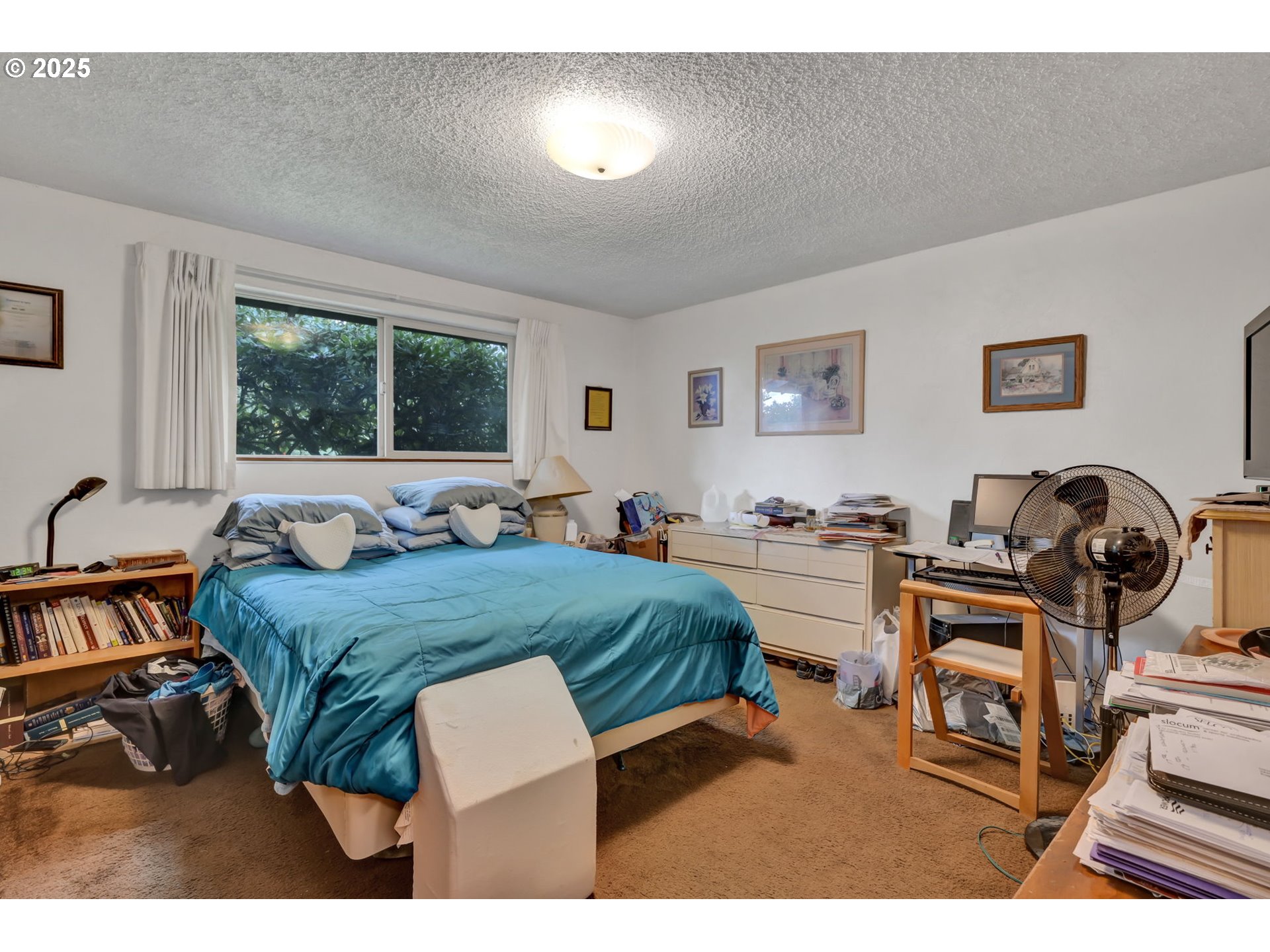 2480 Chuckanut Street Eugene, OR 97408 - Photo 34 of 44 a bed room with a bed and a television