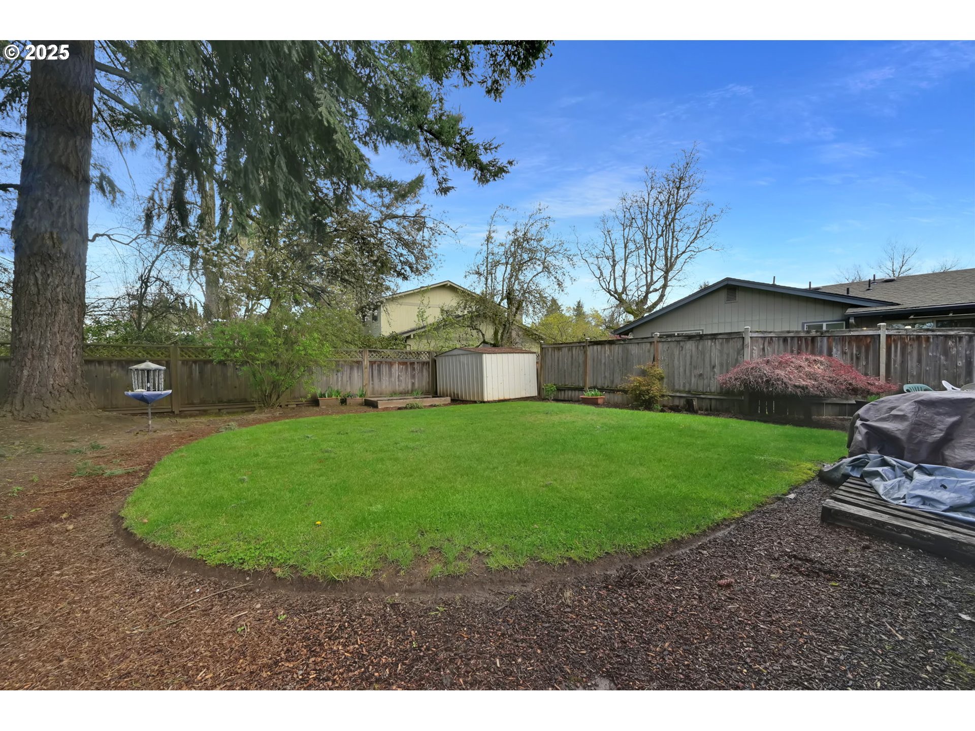 2480 Chuckanut Street Eugene, OR 97408 - Photo 37 of 44 a view of a house with a back yard