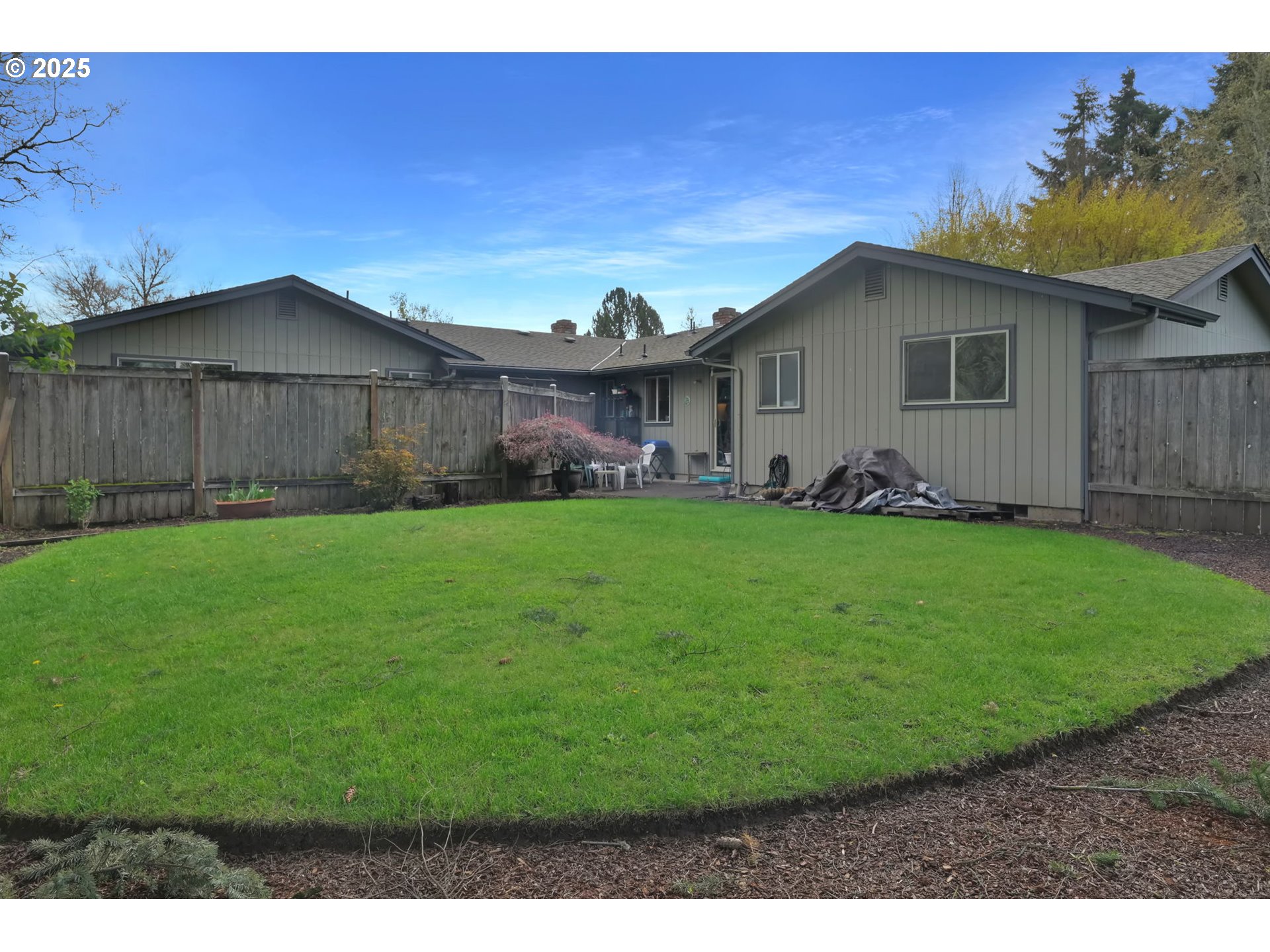 2480 Chuckanut Street Eugene, OR 97408 - Photo 39 of 44 a backyard of a house with lots of green space