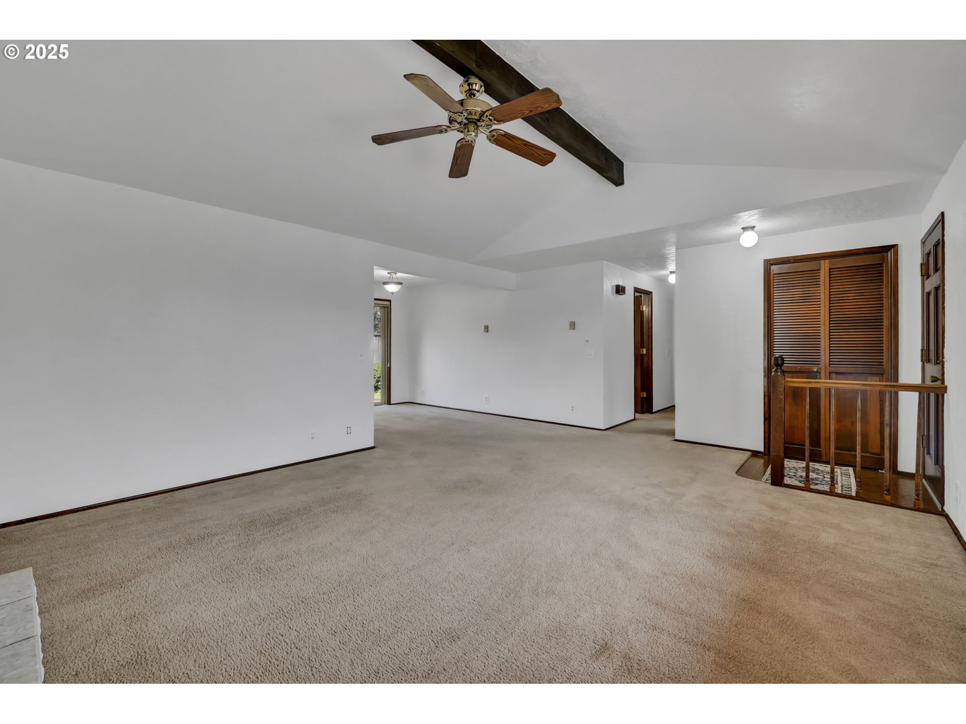2480 Chuckanut Street Eugene, OR 97408 - Photo 6 of 44 a view of an empty room with wooden floor