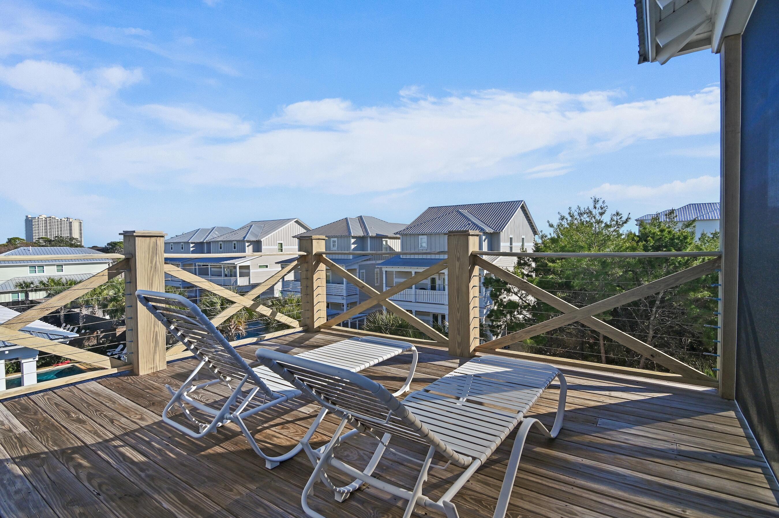57 Penelope Street Miramar Beach, FL 32550 - Photo 16 of 62 a view of a balcony with wooden floor