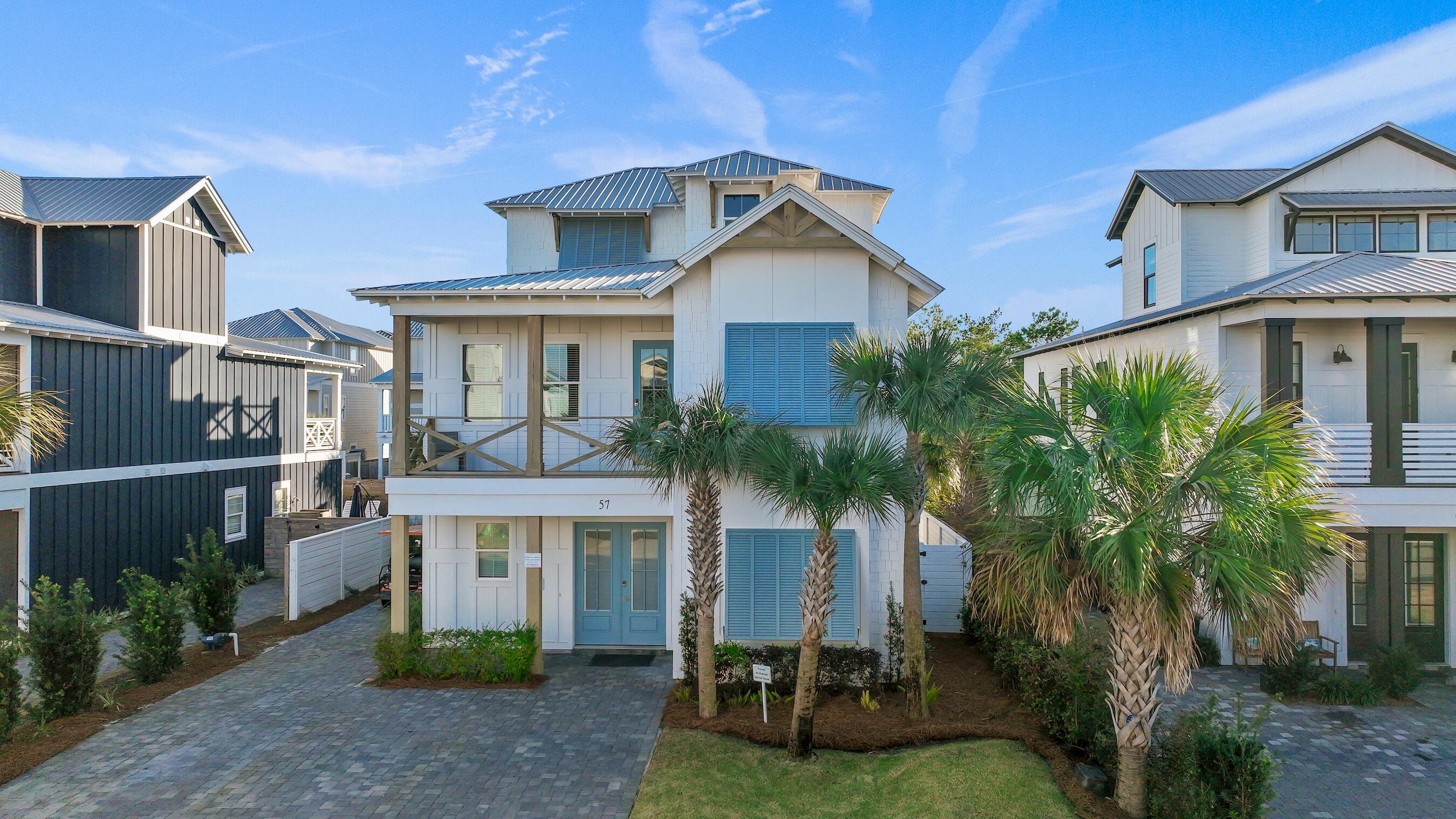 57 Penelope Street Miramar Beach, FL 32550 - Photo 17 of 62 a front view of a house with a yard
