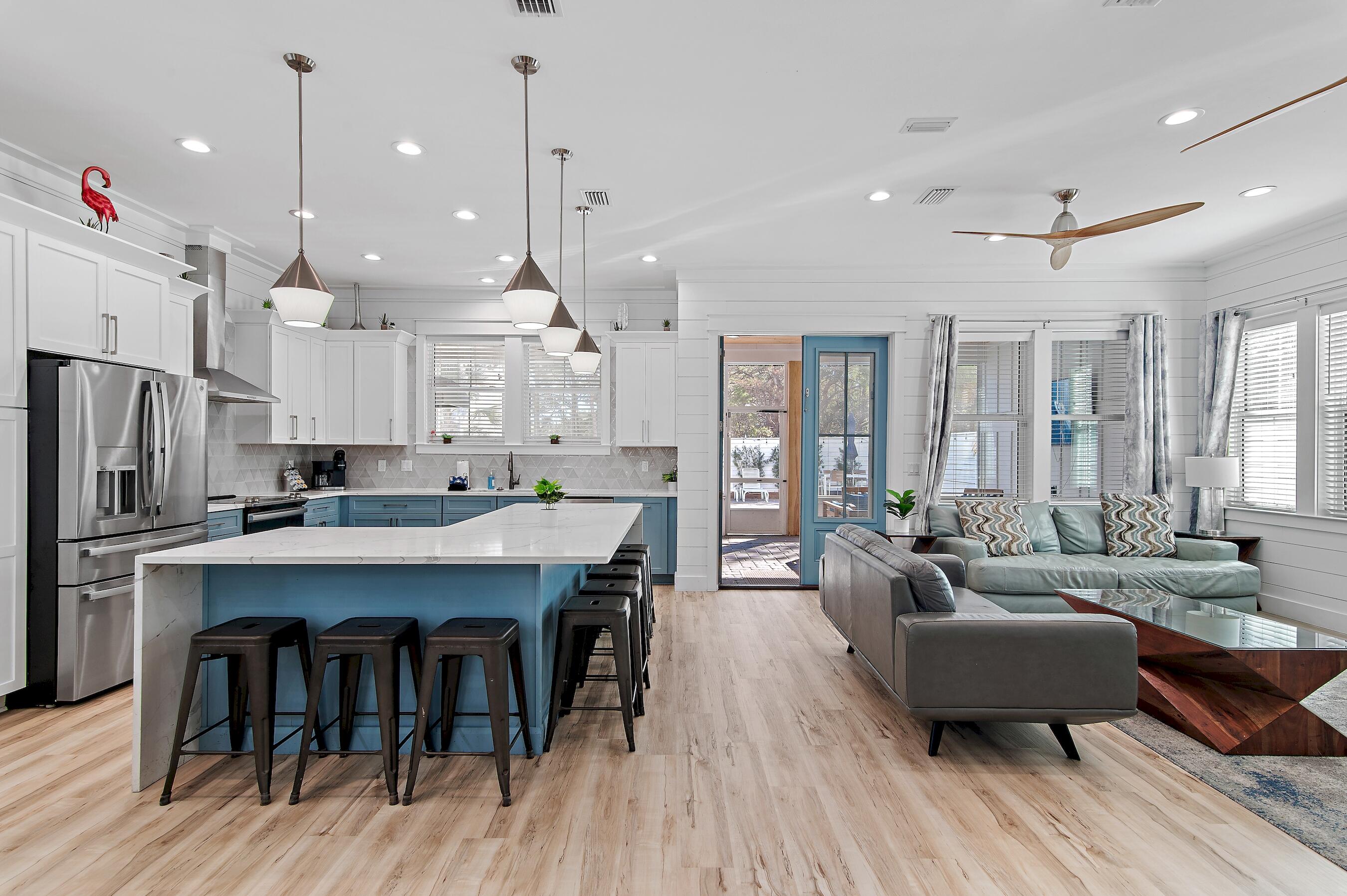 57 Penelope Street Miramar Beach, FL 32550 - Photo 25 of 62 a large kitchen with a table and chairs