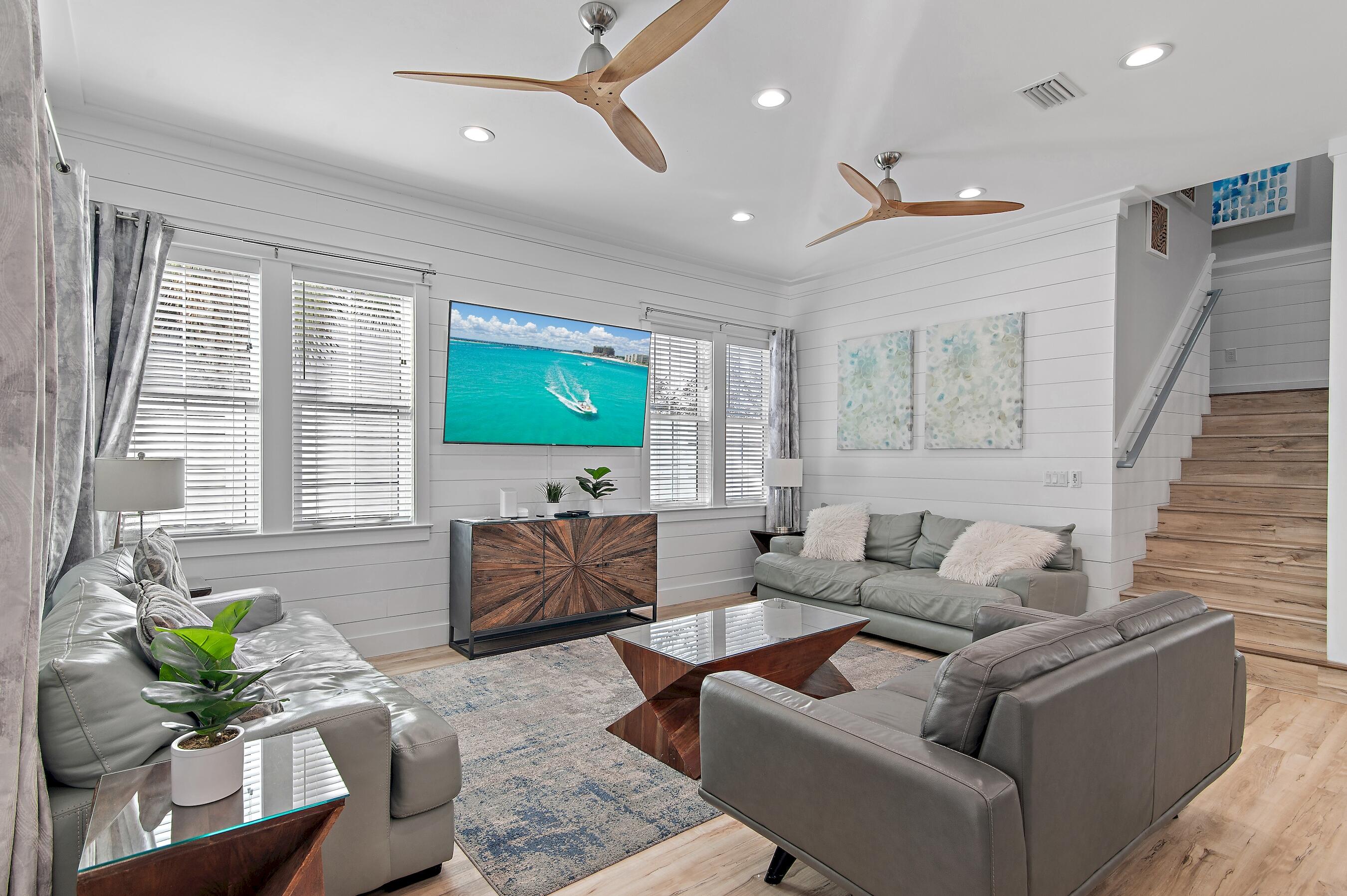 57 Penelope Street Miramar Beach, FL 32550 - Photo 29 of 62 a living room with furniture and a flat screen tv
