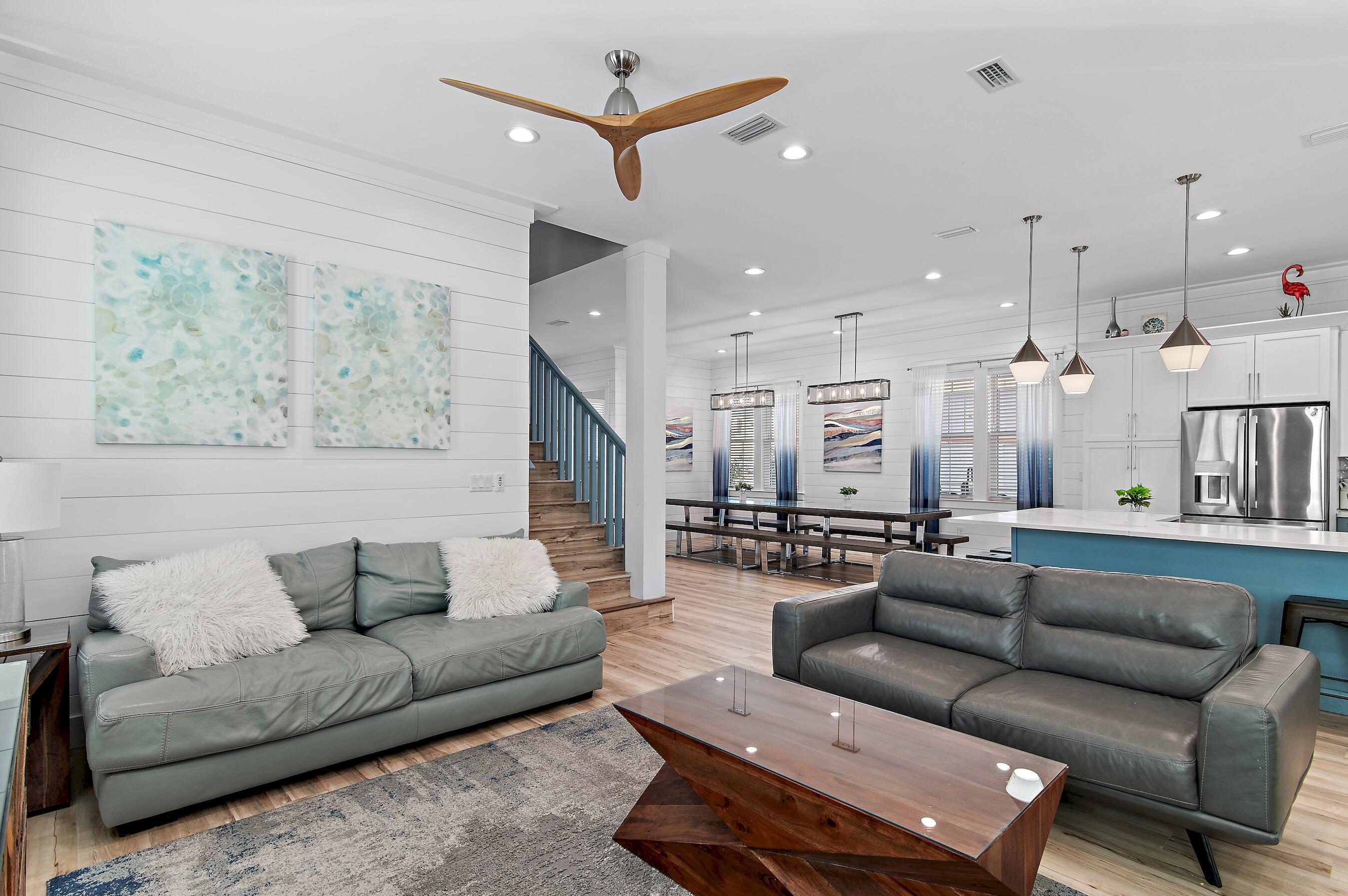 57 Penelope Street Miramar Beach, FL 32550 - Photo 30 of 62 a living room with furniture ceiling fan and a rug