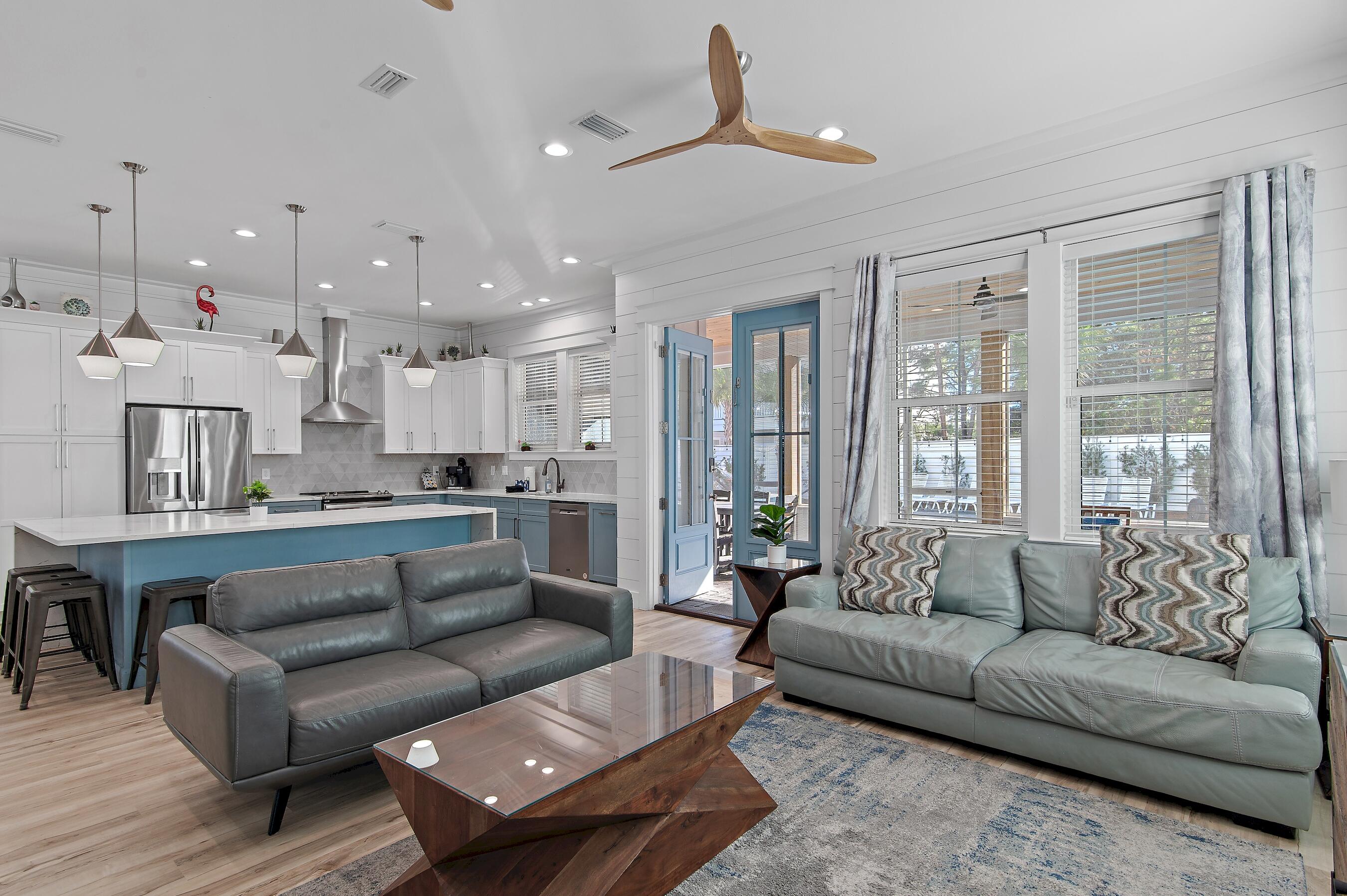 57 Penelope Street Miramar Beach, FL 32550 - Photo 31 of 62 a living room with furniture and a large window