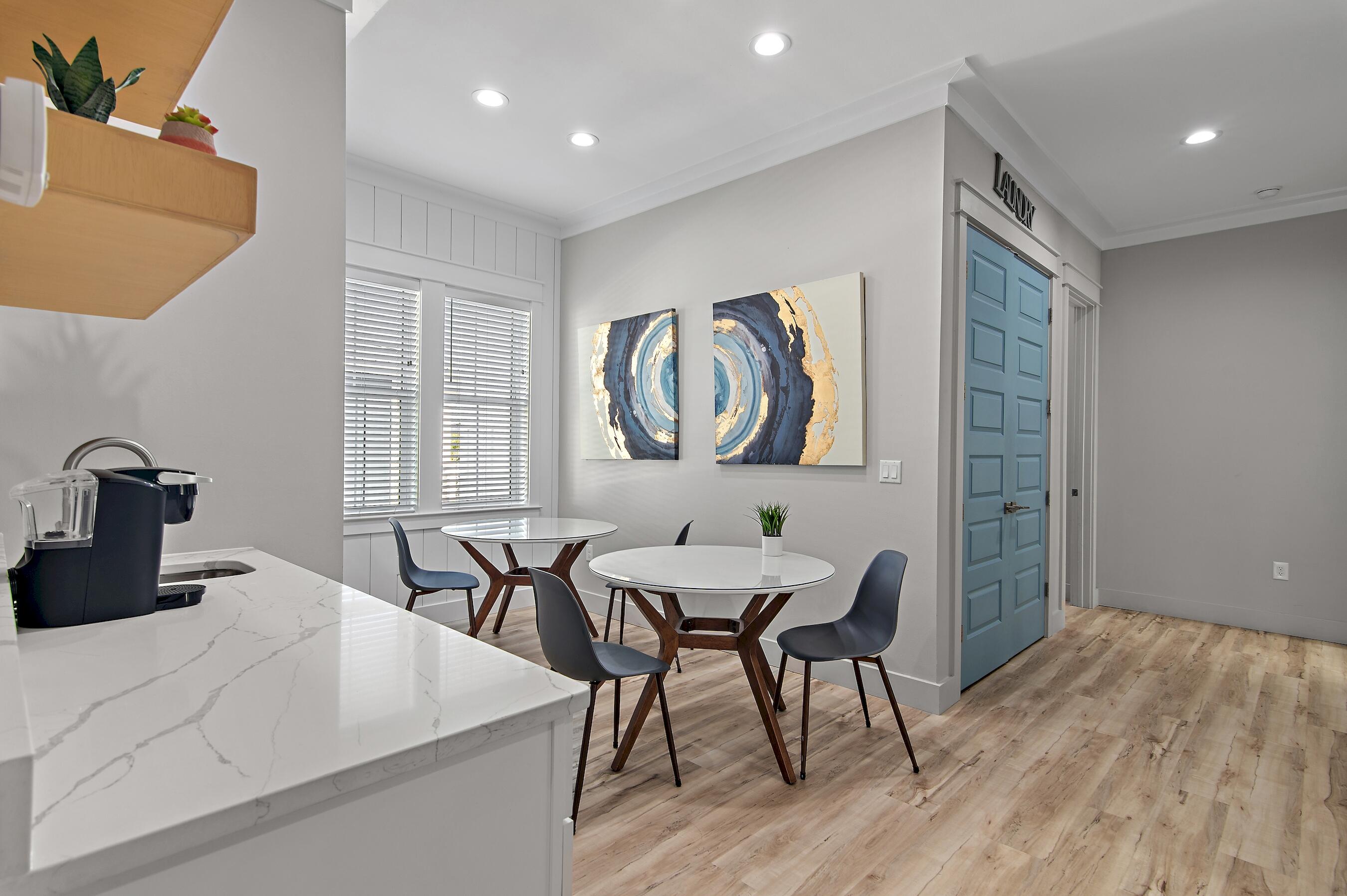 57 Penelope Street Miramar Beach, FL 32550 - Photo 34 of 62 a view of a dining room with furniture and wooden floor
