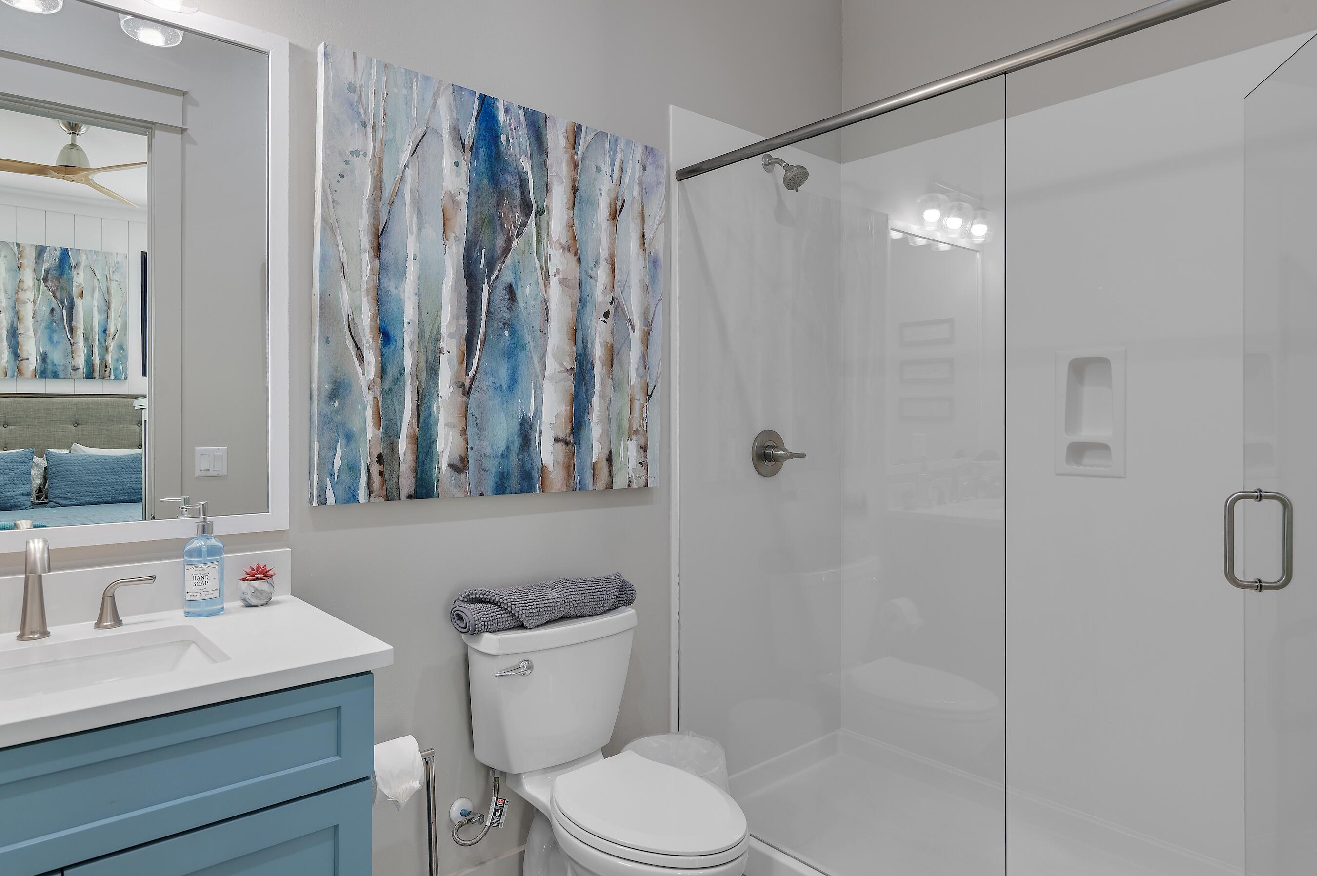 57 Penelope Street Miramar Beach, FL 32550 - Photo 42 of 62 a bathroom with a sink a toilet and shower