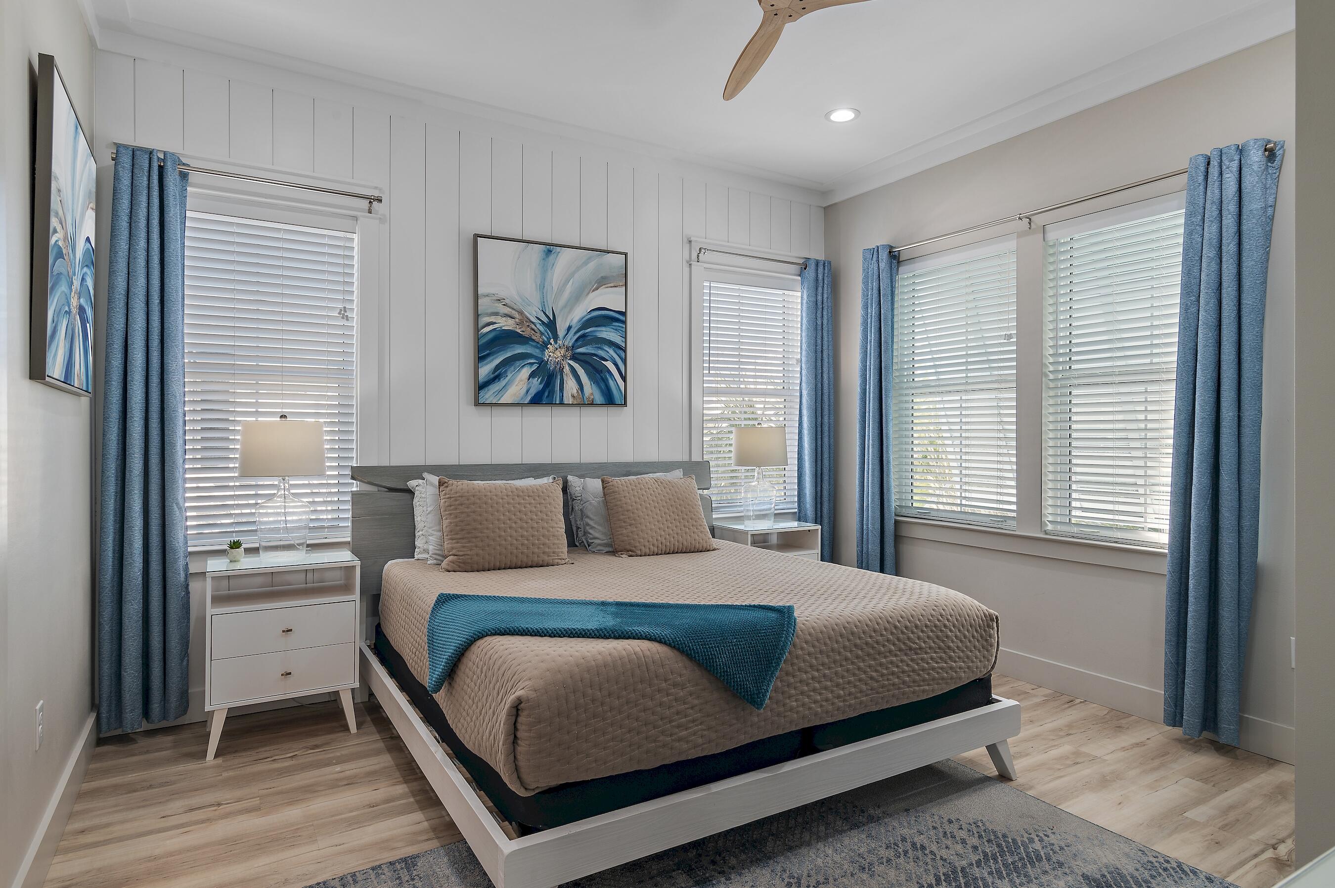 57 Penelope Street Miramar Beach, FL 32550 - Photo 43 of 62 a bedroom with a bed and a large window