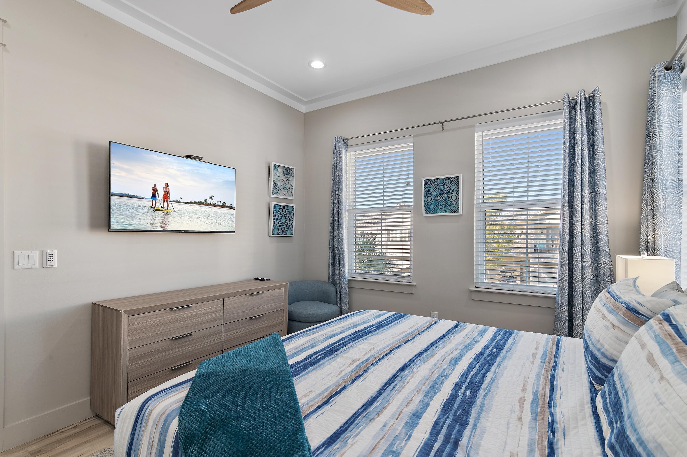 57 Penelope Street Miramar Beach, FL 32550 - Photo 47 of 62 a spacious bedroom with a bed and a window