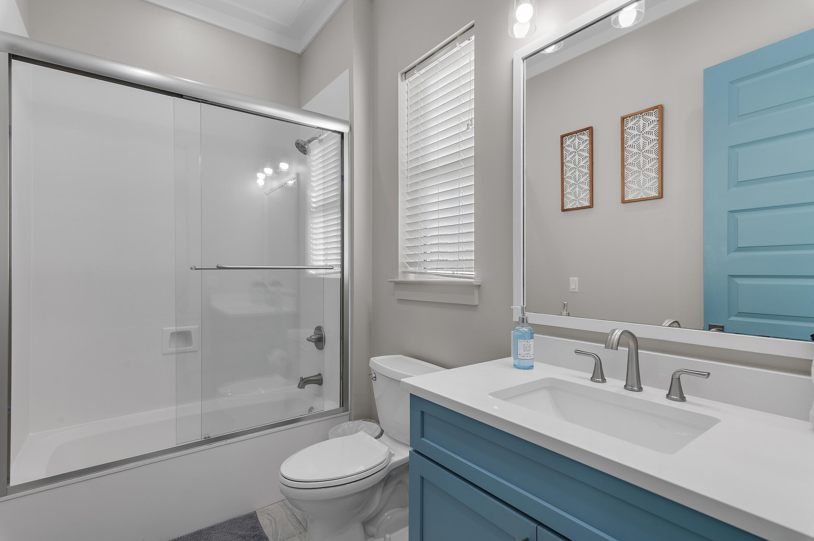 57 Penelope Street Miramar Beach, FL 32550 - Photo 51 of 62 a bathroom with a sink toilet and shower