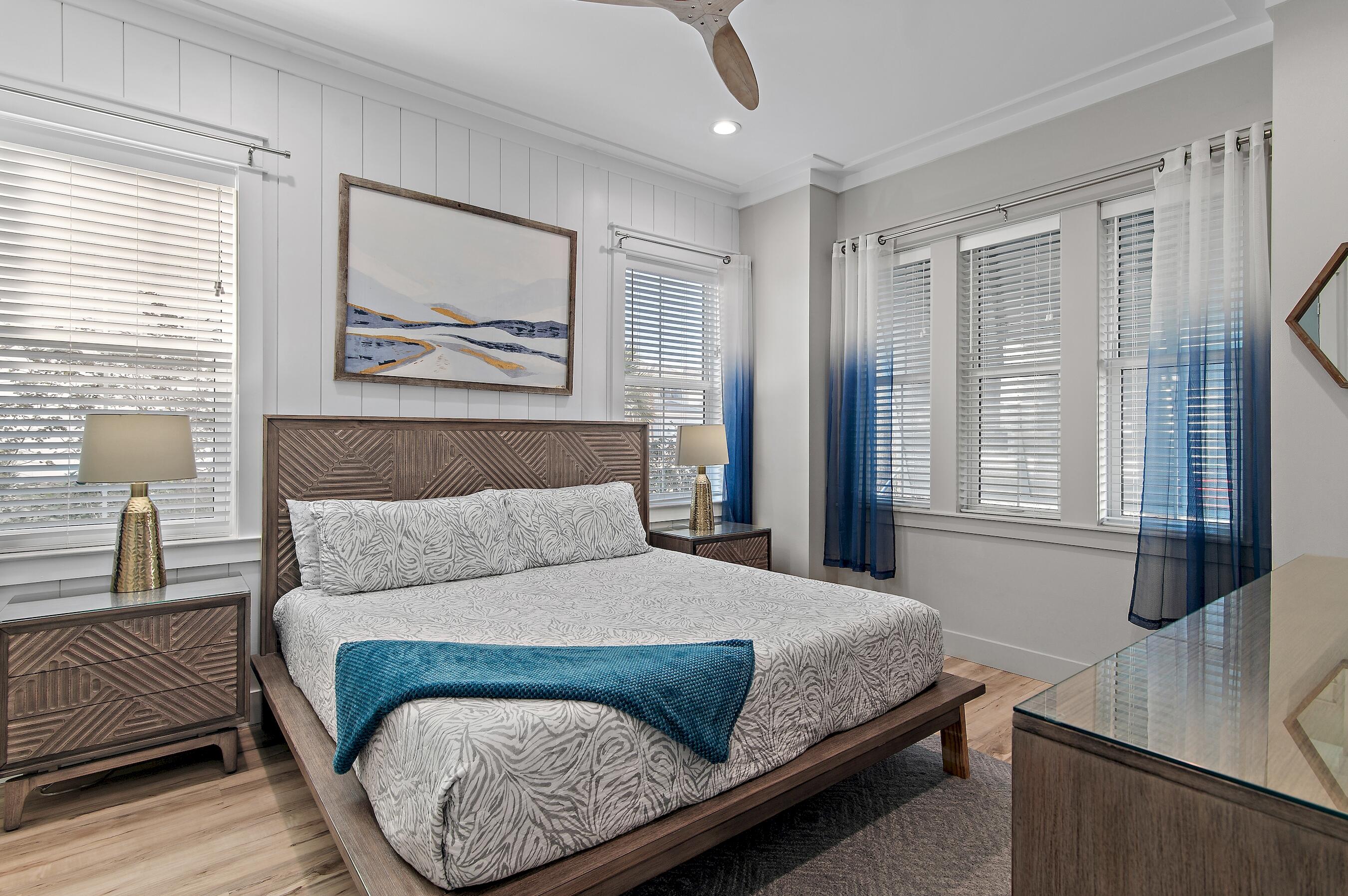 57 Penelope Street Miramar Beach, FL 32550 - Photo 53 of 62 a bedroom with a large bed and a window