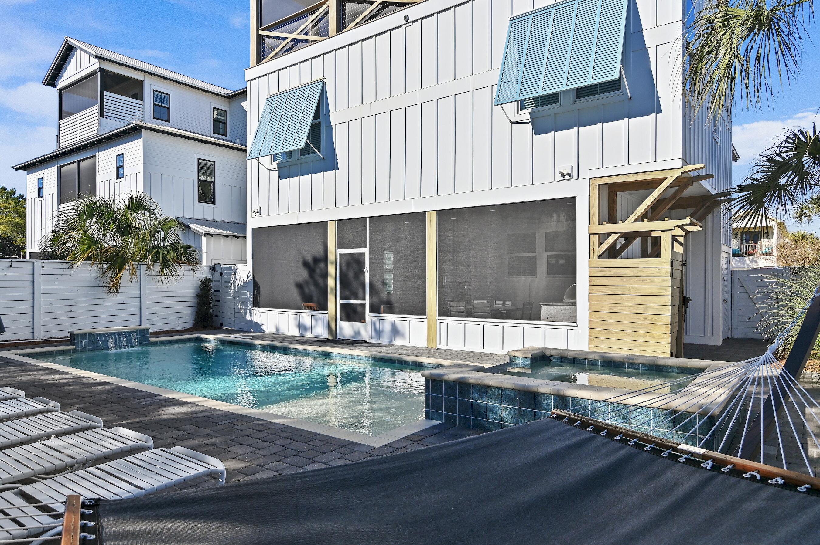57 Penelope Street Miramar Beach, FL 32550 - Photo 57 of 62 a view of a house with pool and sitting area
