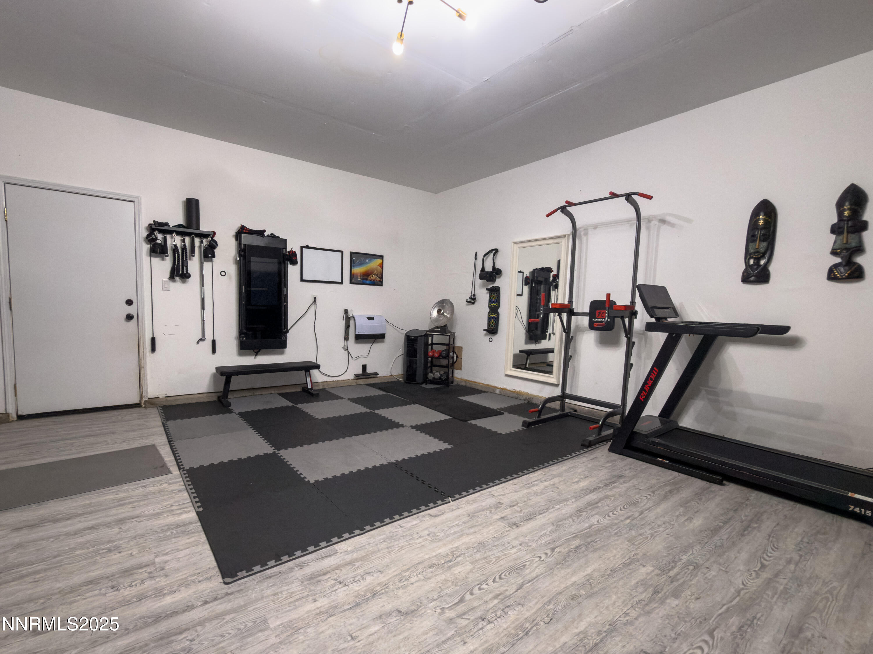 9635 Meadowstar Drive Reno, NV 89506 - Photo 13 of 26 a view of a room with gym equipment