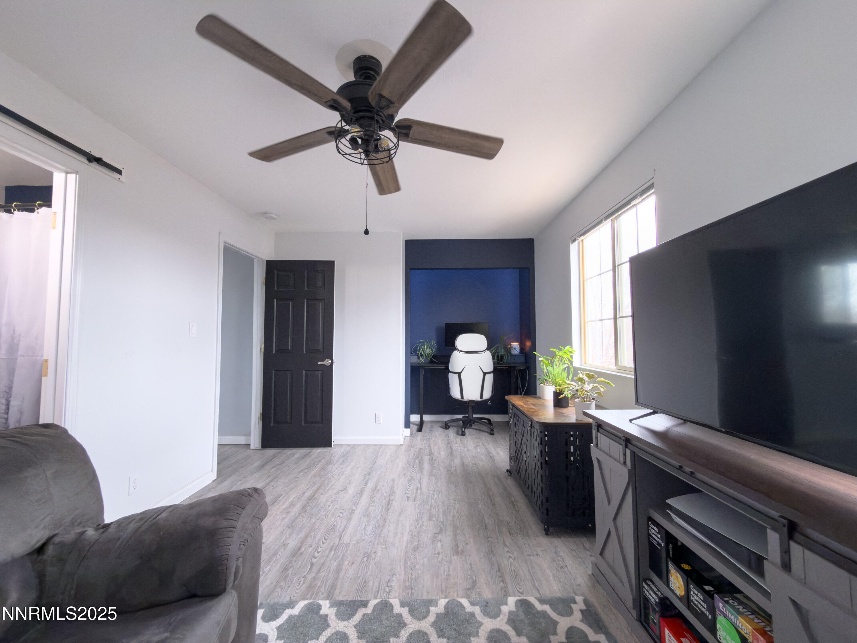 9635 Meadowstar Drive Reno, NV 89506 - Photo 15 of 26 a living room with furniture and a flat screen tv