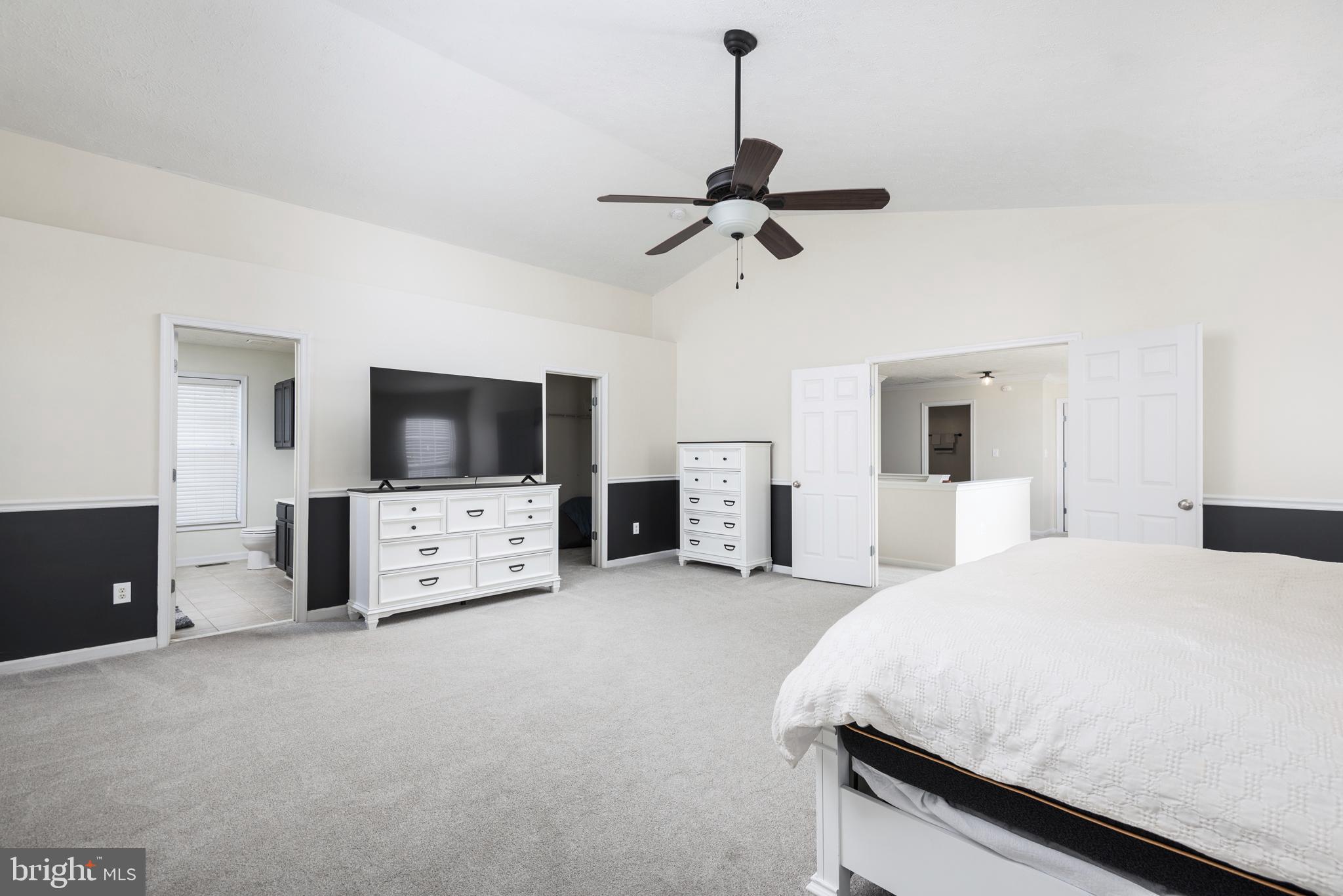1208 Painted Fern Road Denton, MD 21629 - Photo 28 of 39 a living room with furniture and a flat screen tv