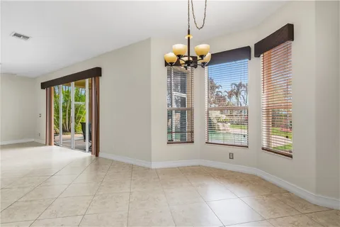a view of entryway and hall with a front door