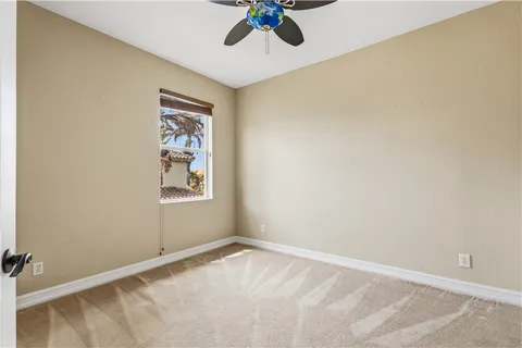 a view of a house with backyard porch and sitting area