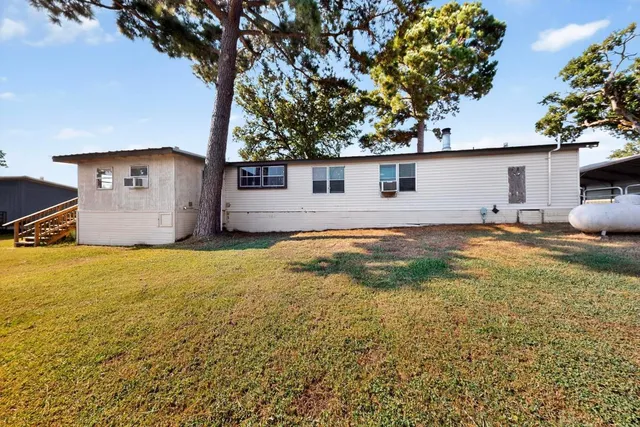 a house view with a garden space