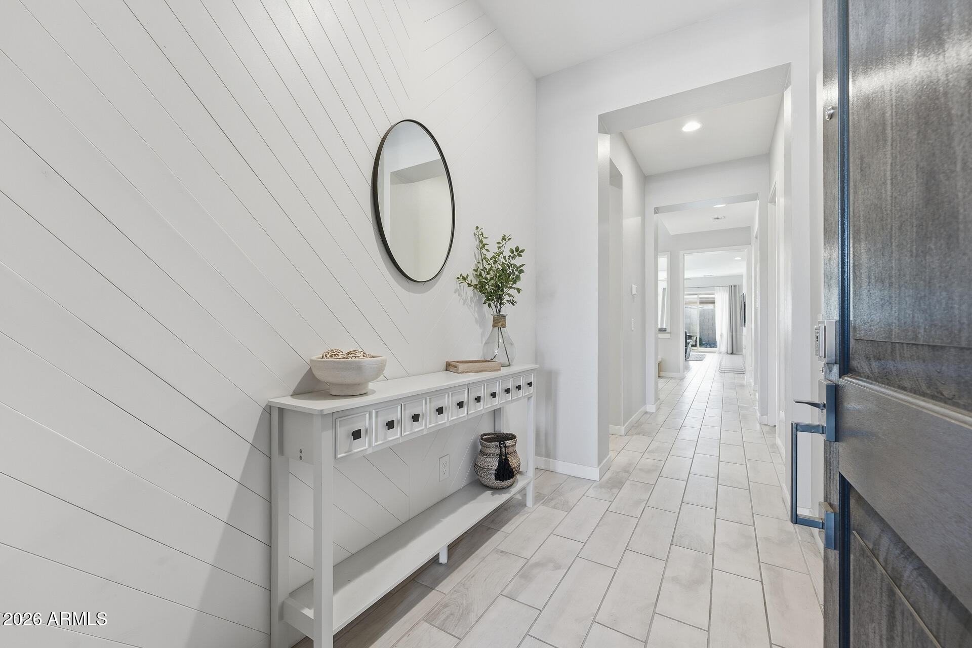 23069 East Mayberry Road Queen Creek, AZ 85142 - Photo 4 of 48 a view of a hallway with washer and dryer
