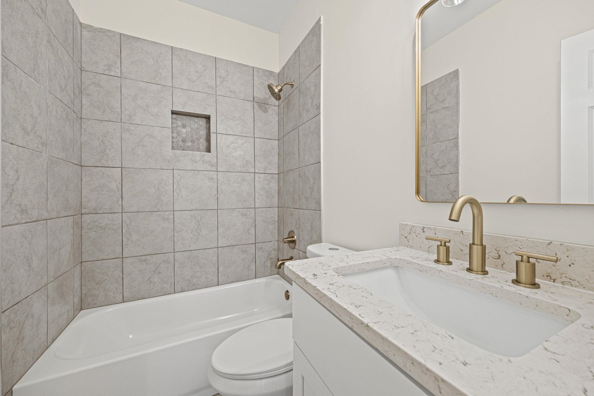 8670 Valmont Circle Memphis, TN 38016 - Photo 19 of 33 Full bathroom featuring bathtub / shower combination and vanity