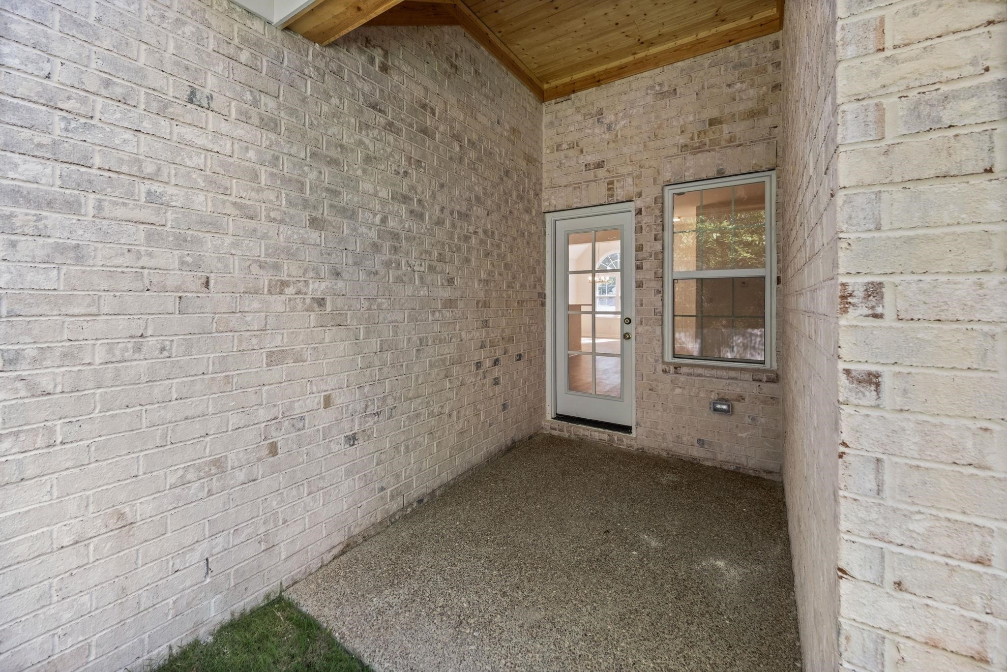 8670 Valmont Circle Memphis, TN 38016 - Photo 28 of 33 Entrance to property featuring brick siding and a patio area