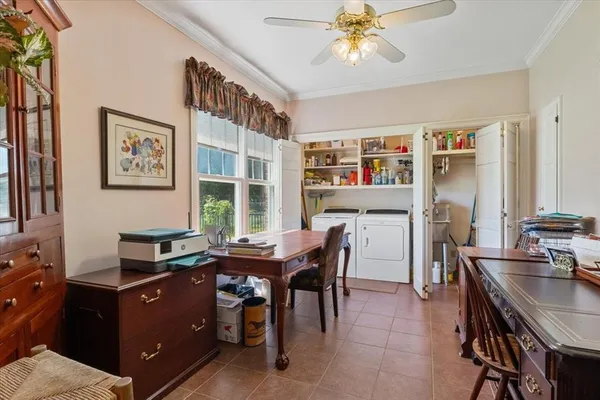 a view of a workspace with furniture