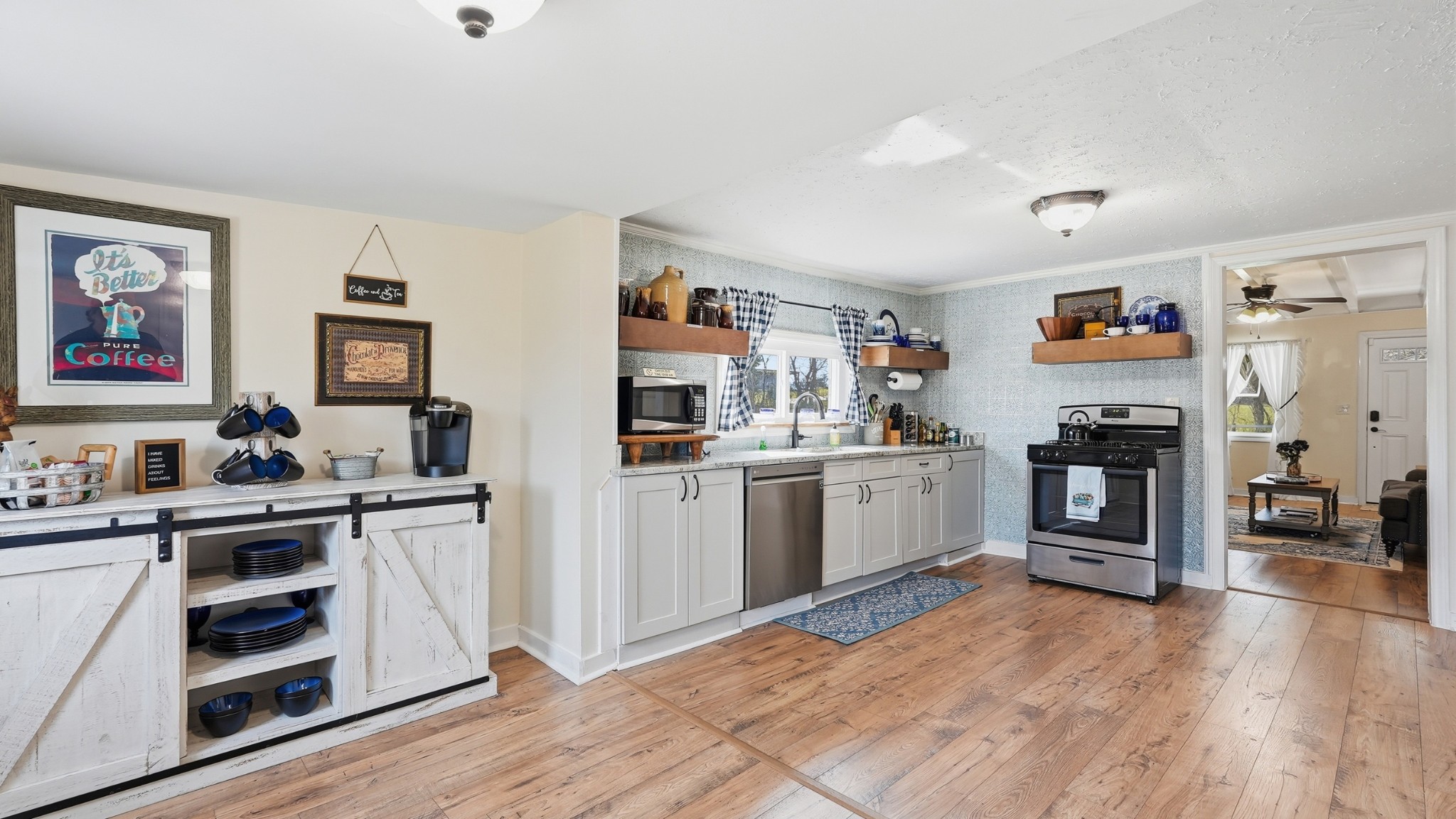 2820 Lockertsville Road Ashland City, TN 37015 - Photo 25 of 47 a kitchen with stainless steel appliances a stove top oven and cabinets